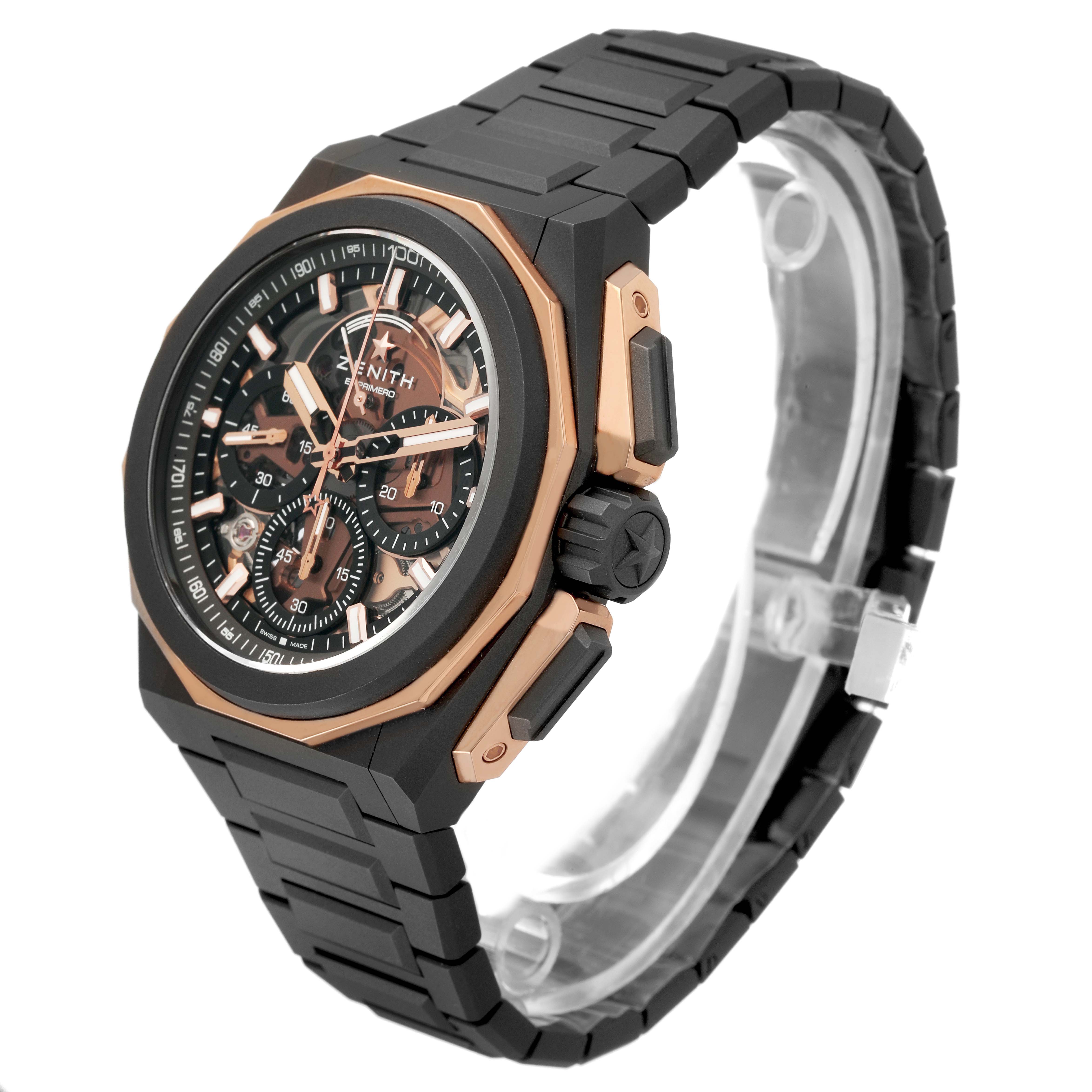 The Zenith Defy 87.9100.9004 Men's Titanium Grey Dial watch is shown at a three-quarter angle, highlighting the dial, bezel, crown, pushers, and the bracelet.