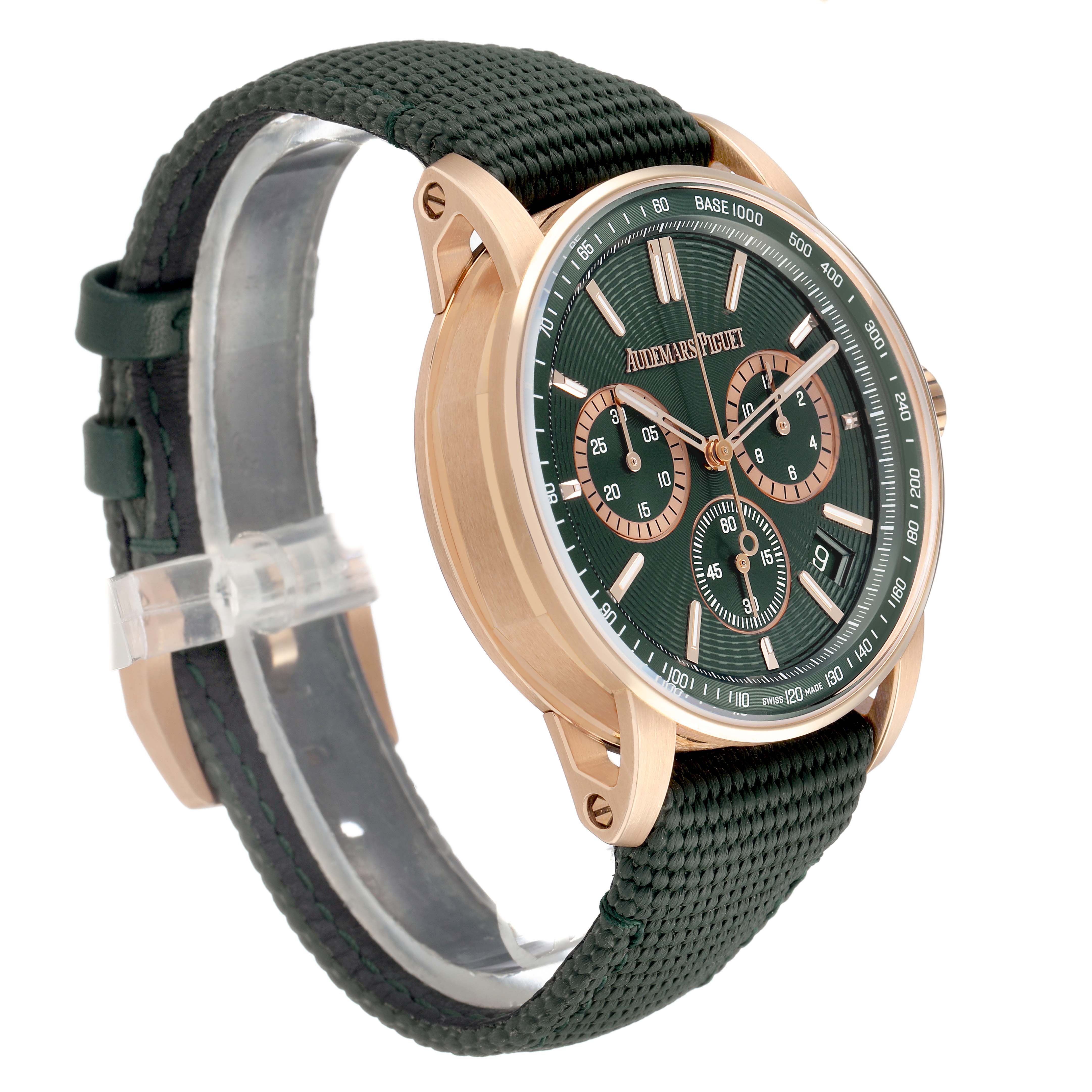 The image shows a Code 11.59 by Audemars Piguet at a side angle, highlighting the green dial, rose gold case, and strap details.