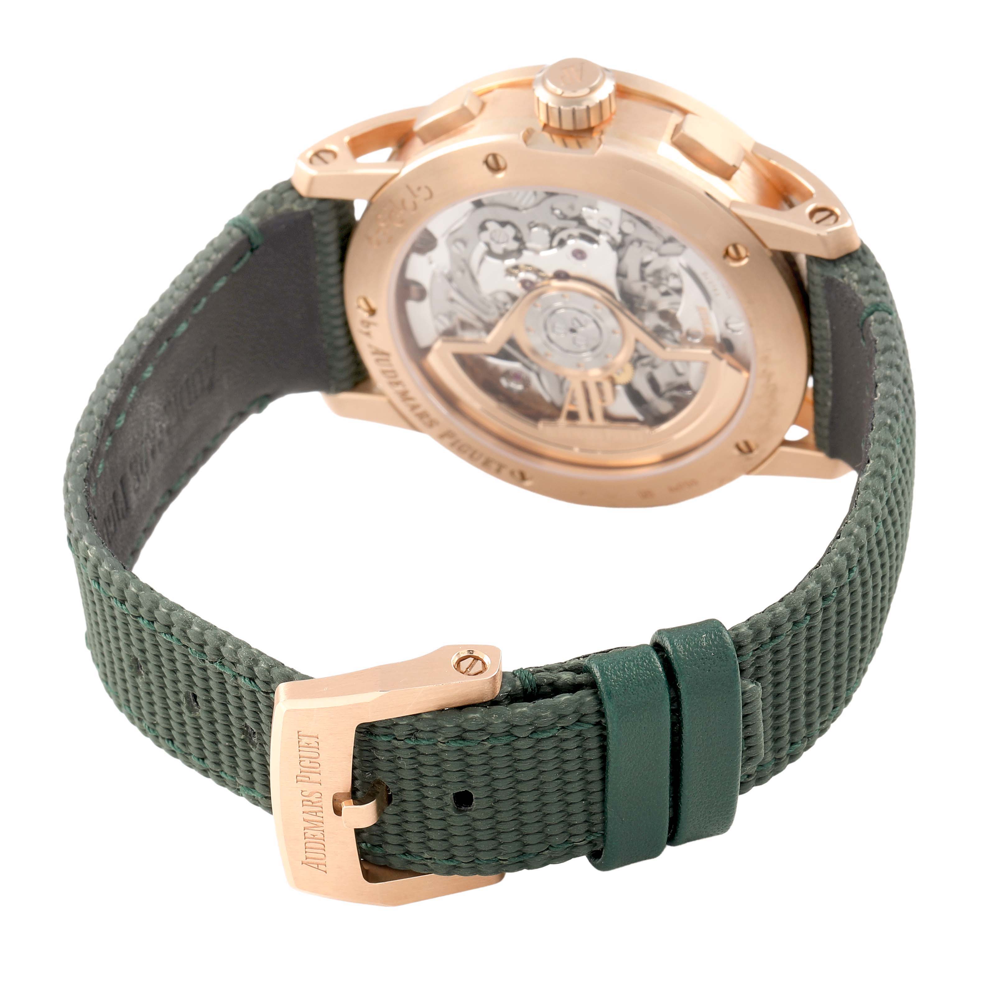 The Audemars Piguet Code 11.59 26393OR Men's Rose Gold Green Dial watch is shown from the back, highlighting the movement and green strap with buckle.