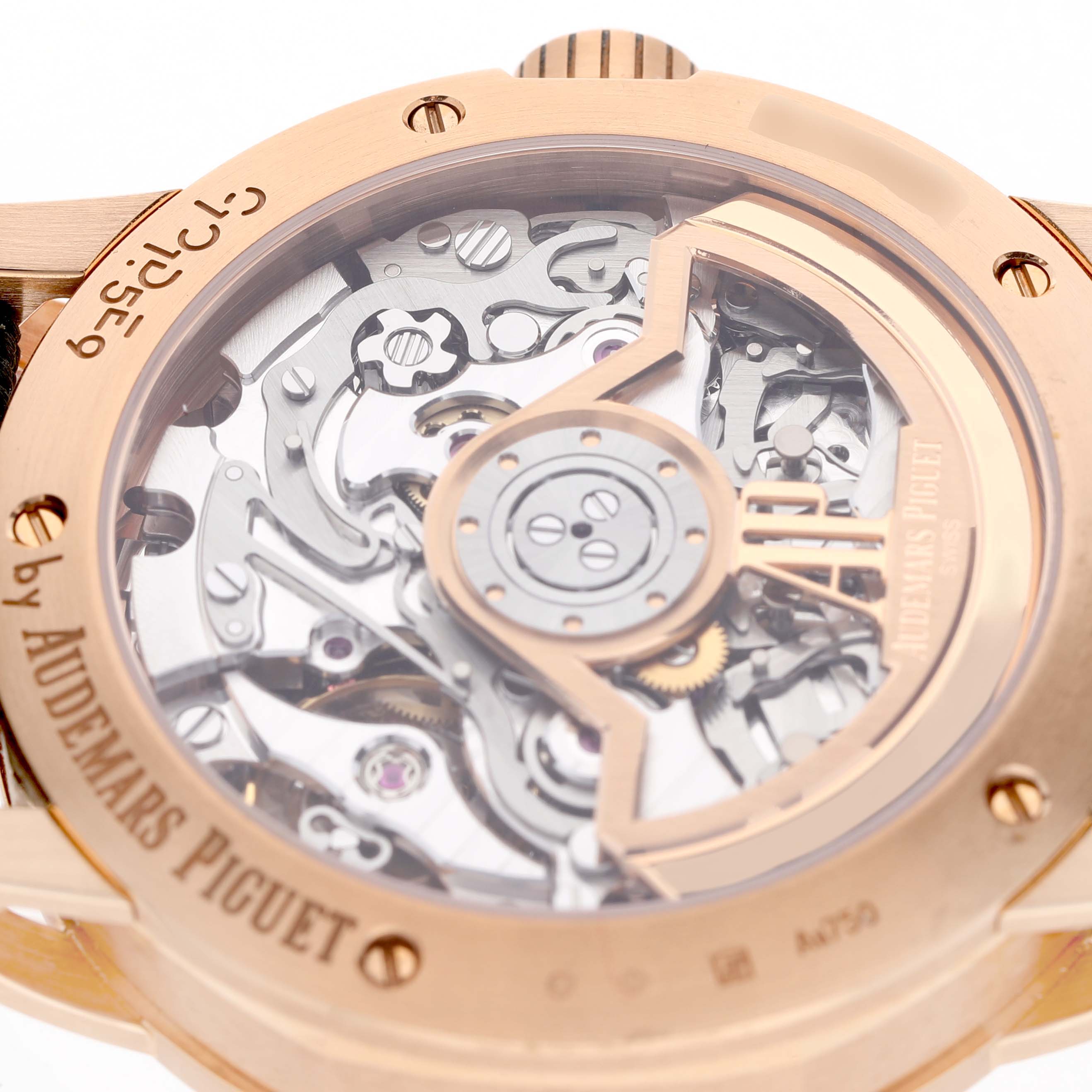 The image shows the back view of the Audemars Piguet Code 11.59 26393OR Men's Rose Gold Green Dial watch, highlighting its movement and transparent case back.