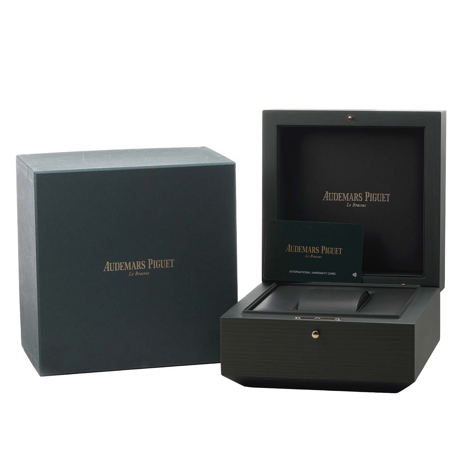 The image shows the packaging for a Code 11.59 by Audemars Piguet, including the watch box and international warranty card.