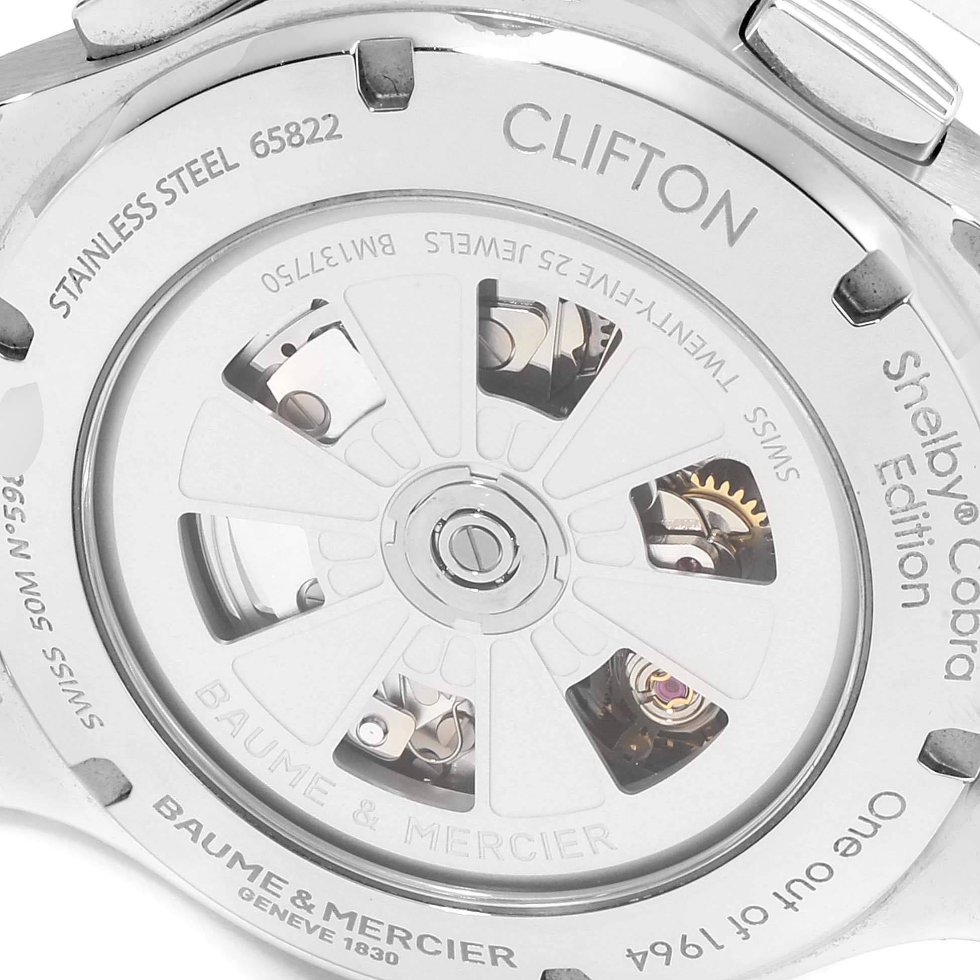 The image shows the back of a Baume & Mercier Clifton M0A10342 Men's Stainless Steel Silver Dial M0A10342 Men's Stainless Steel Silver Dial model watch, displaying its mechanical movement and engravings.