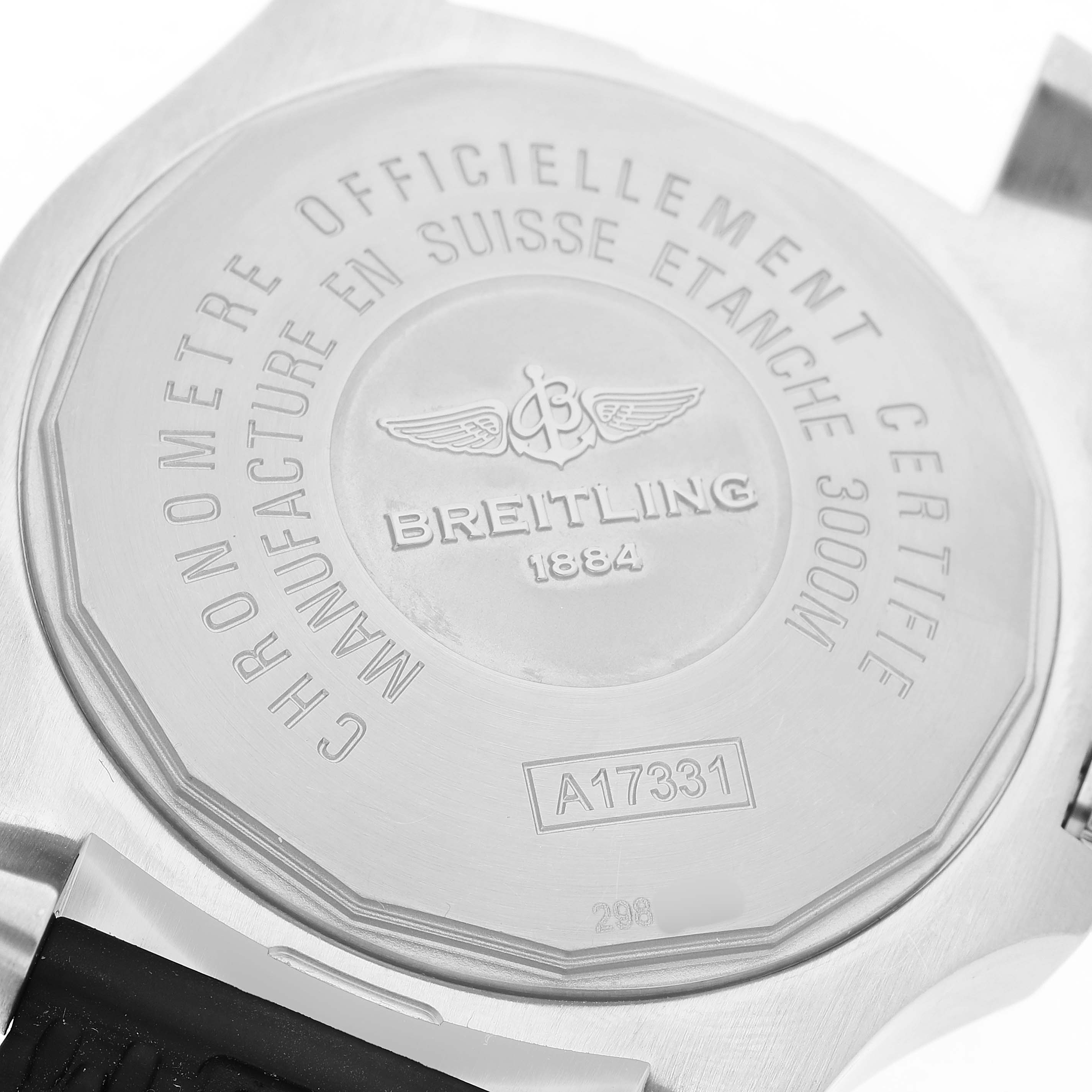 The image shows the back case of a Breitling Avenger A17331 Men's Stainless Steel Yellow Dial watch, displaying engravings and model information.