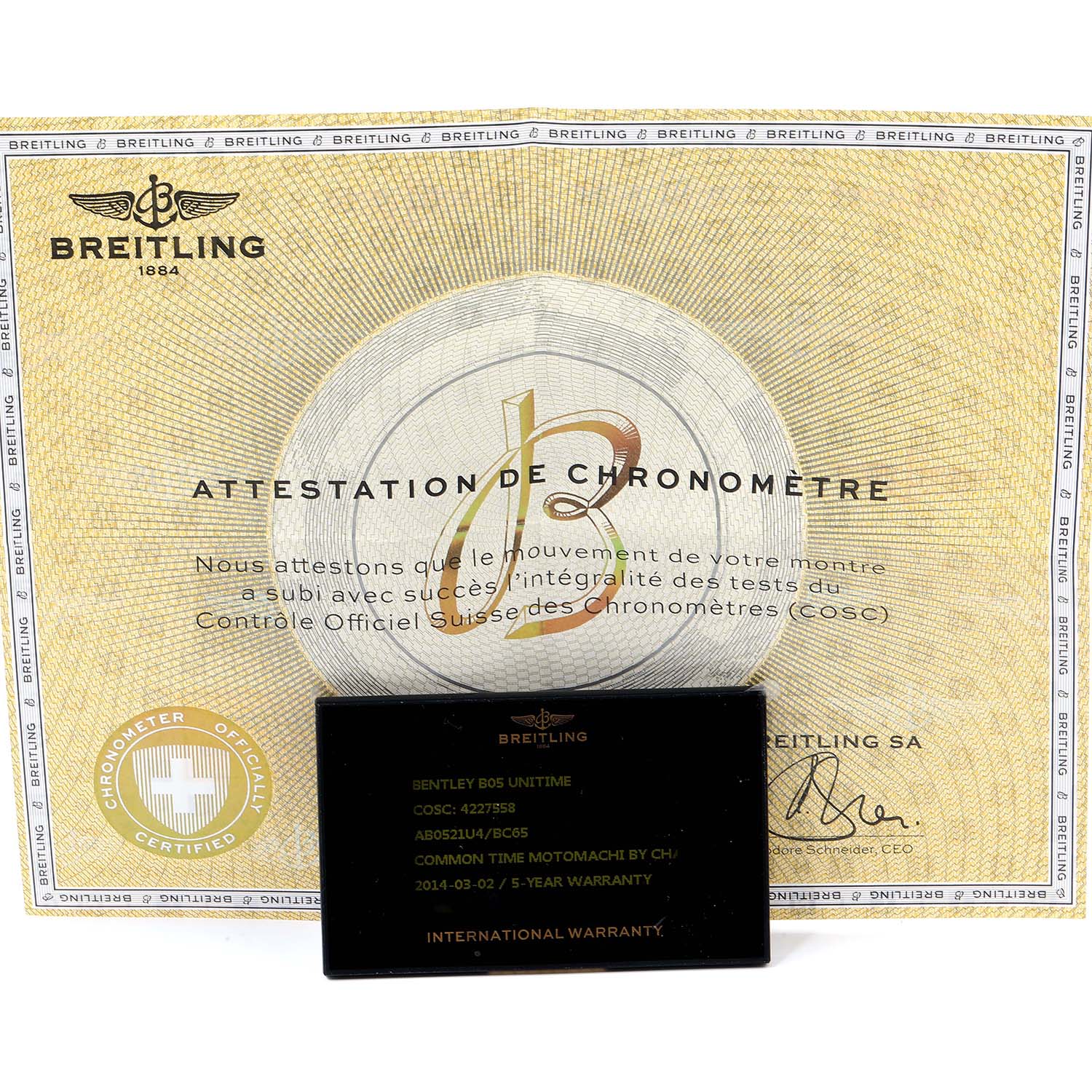 This image shows the warranty card and chronometer certificate for a Breitling Bentley AB0521U4/BC65 Men's Stainless Steel Black Dial AB0521U4/BC65 Men's Stainless Steel Black Dial model watch.