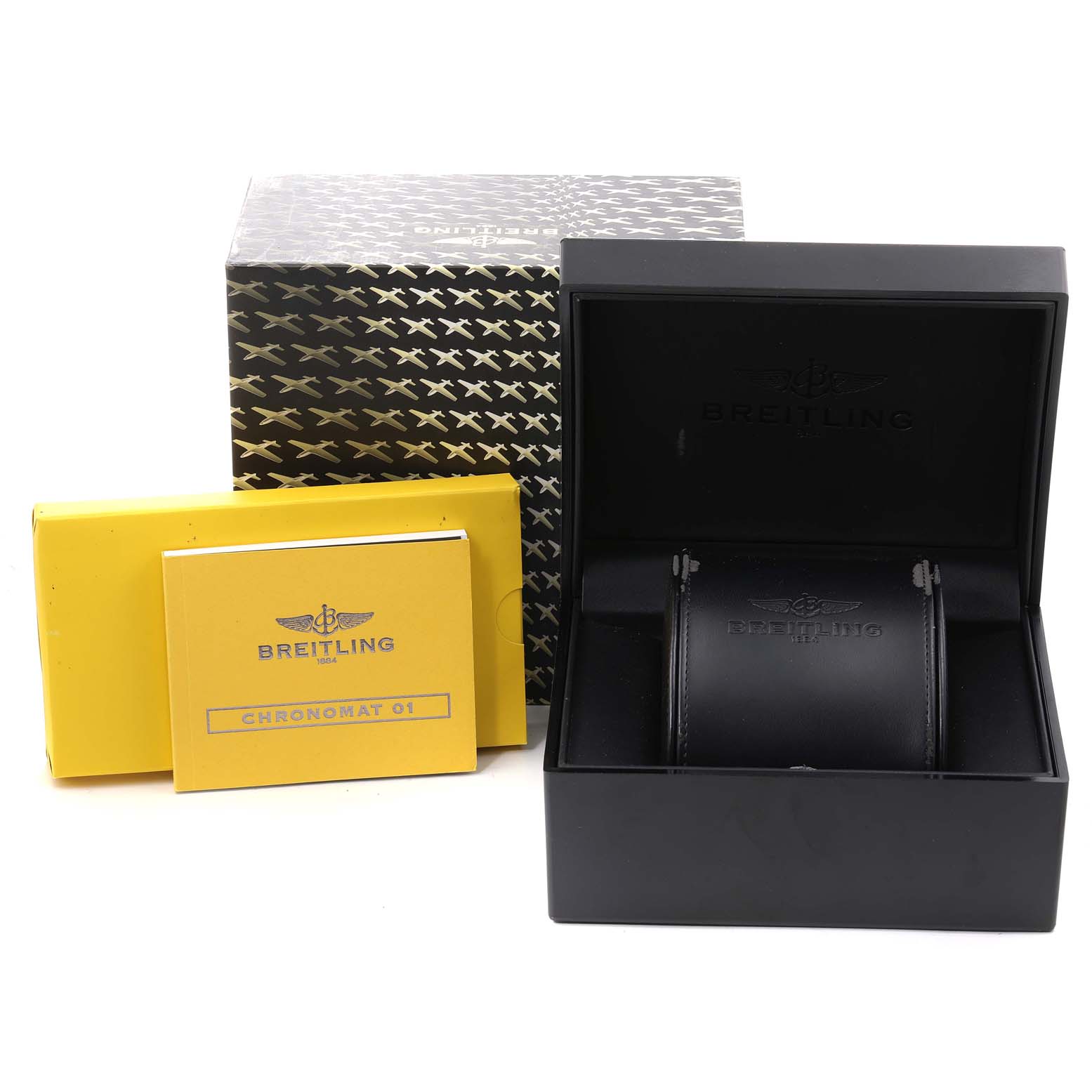 The image shows the packaging, manual, and watch case for a Breitling Chronomat AB011110/BA50-SS Men
s Stainless Steel Black Dial AB011110/BA50-SS Men
s Stainless Steel Black Dial model, viewed from the front.