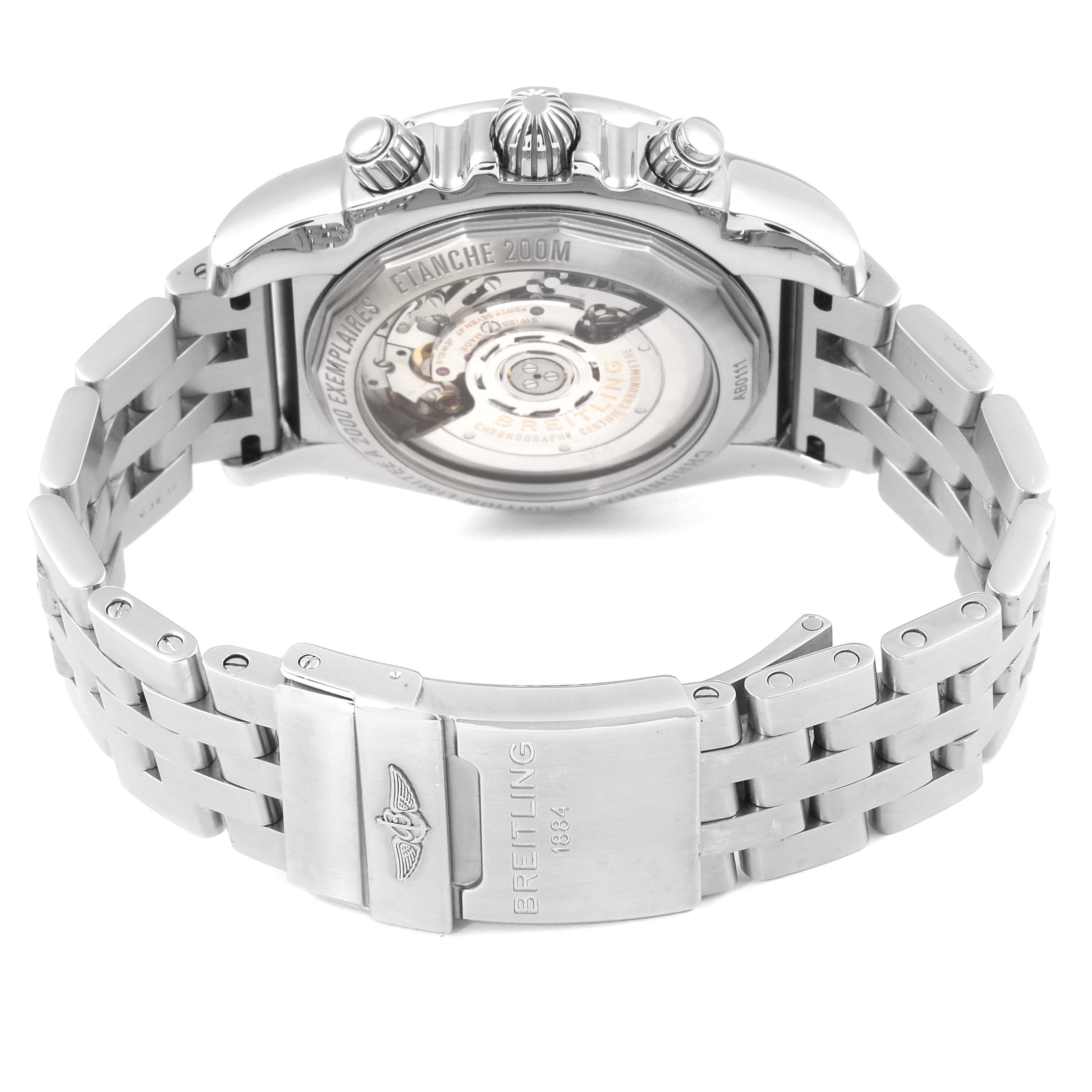 The image shows the back of a Breitling Chronomat AB011110/BA50-SS Men
s Stainless Steel Black Dial AB011110/BA50-SS Men
s Stainless Steel Black Dial watch, highlighting its transparent caseback and metal bracelet with a clasp.