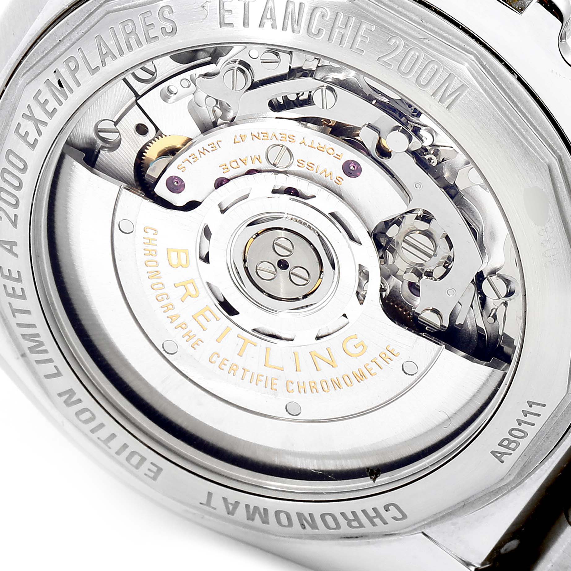 The image shows the back of a Breitling Chronomat AB011110/BA50-SS Men
s Stainless Steel Black Dial AB011110/BA50-SS Men
s Stainless Steel Black Dial watch, revealing its internal mechanical movement details.