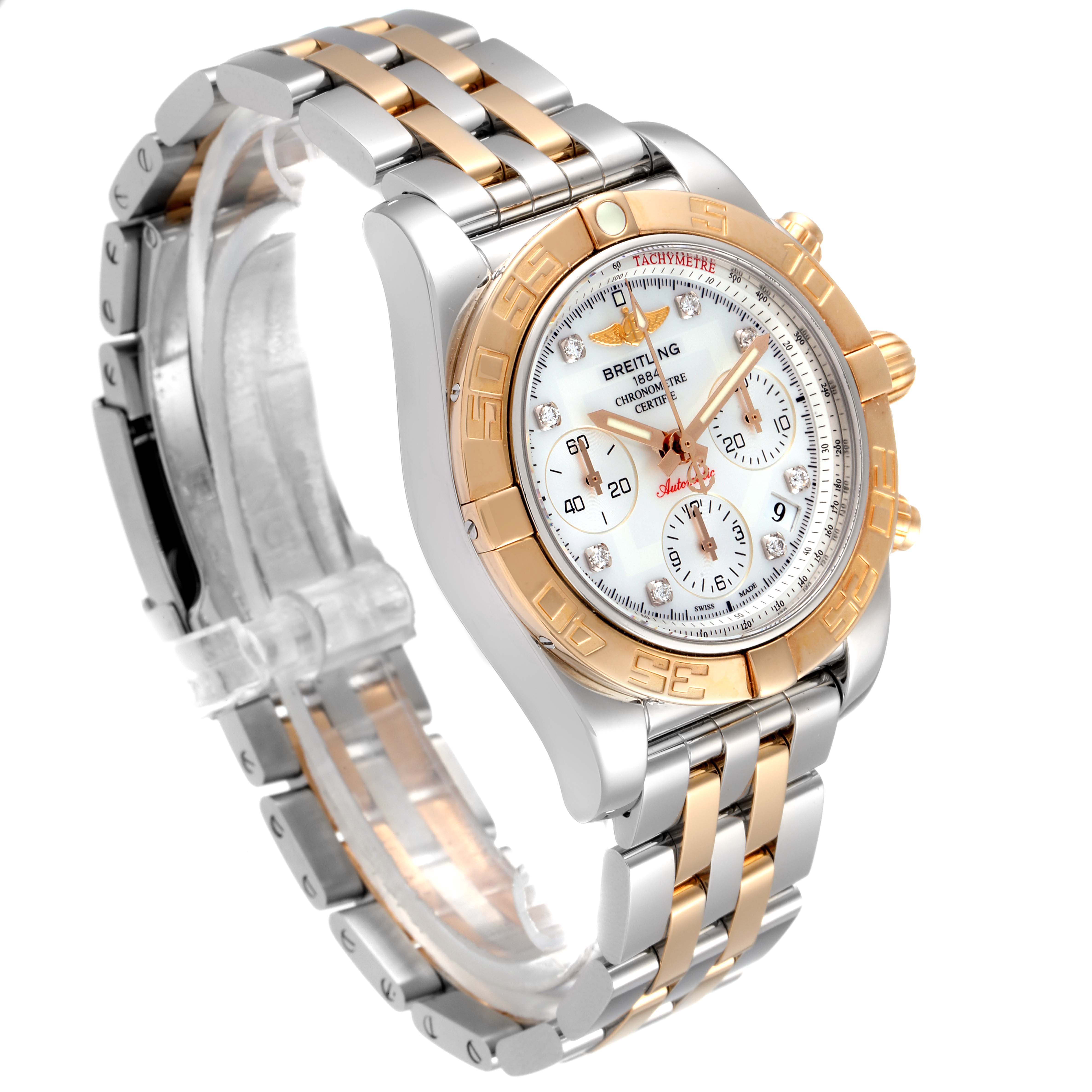 The image shows a Breitling Chronomat CB014012/A723 Men's Steel and Gold (two tone) Mother of Pearl Dial CB014012/A723 Men's Steel and Gold (two tone) Mother of Pearl Dial watch at a three-quarter angle, displaying its face and two-tone metal bracelet.