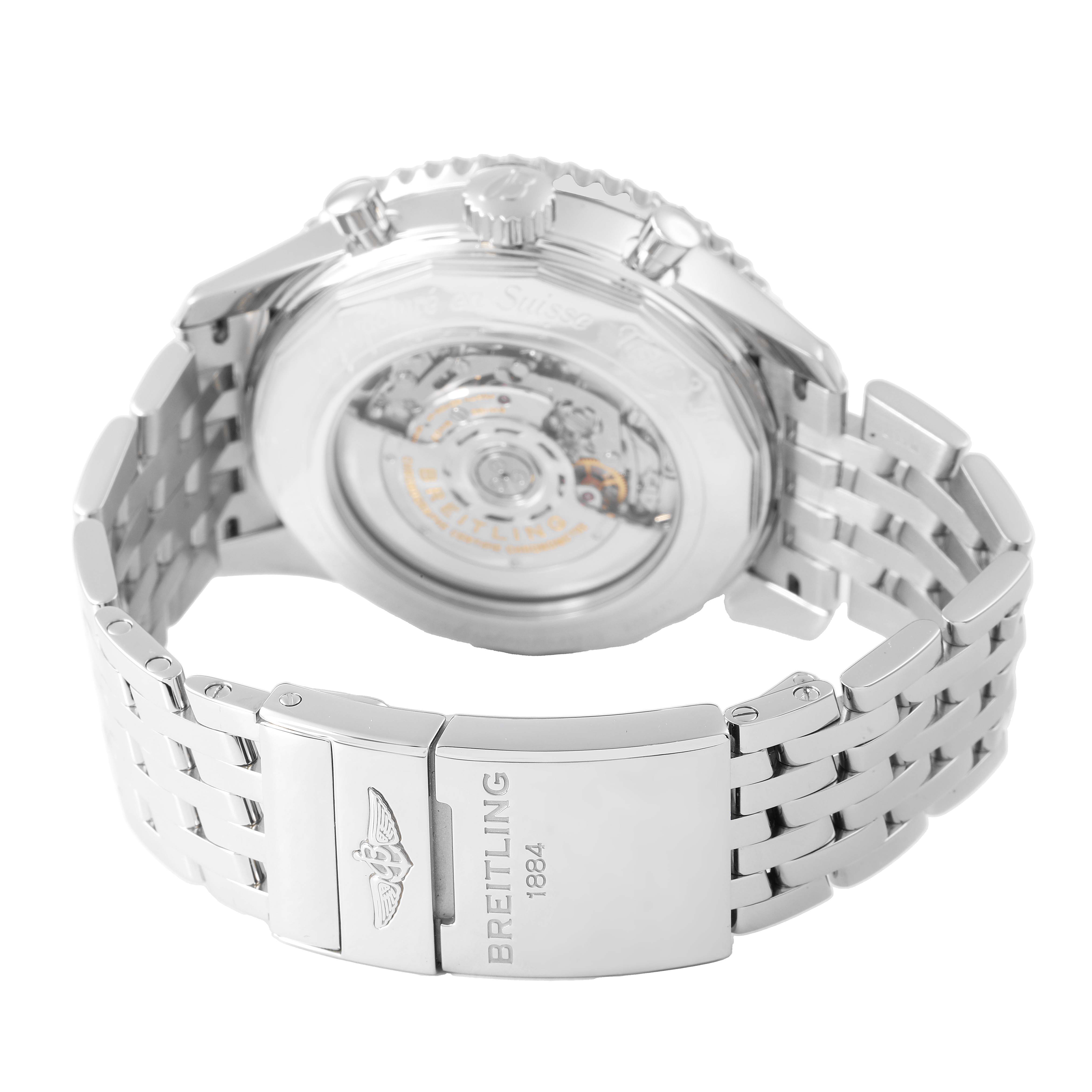The Breitling Navitimer AB0441 Men's Stainless Steel Silver Dial watch is shown from the back, featuring its exhibition case back and metal bracelet with a clasp.