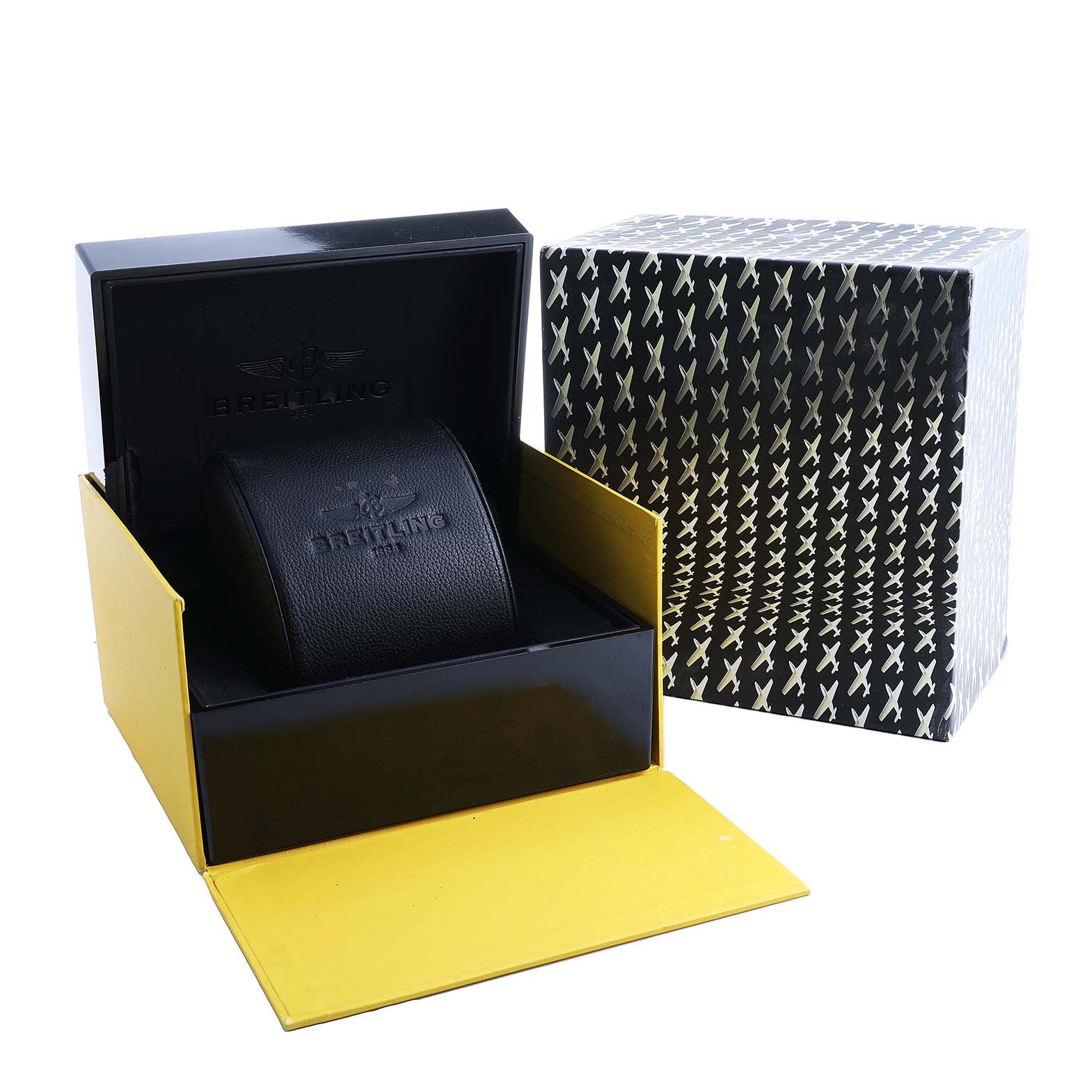 The image shows the packaging for the Breitling Navitimer AB0441 Men's Stainless Steel Silver Dial, including a black inner box with logo and a yellow outer box.