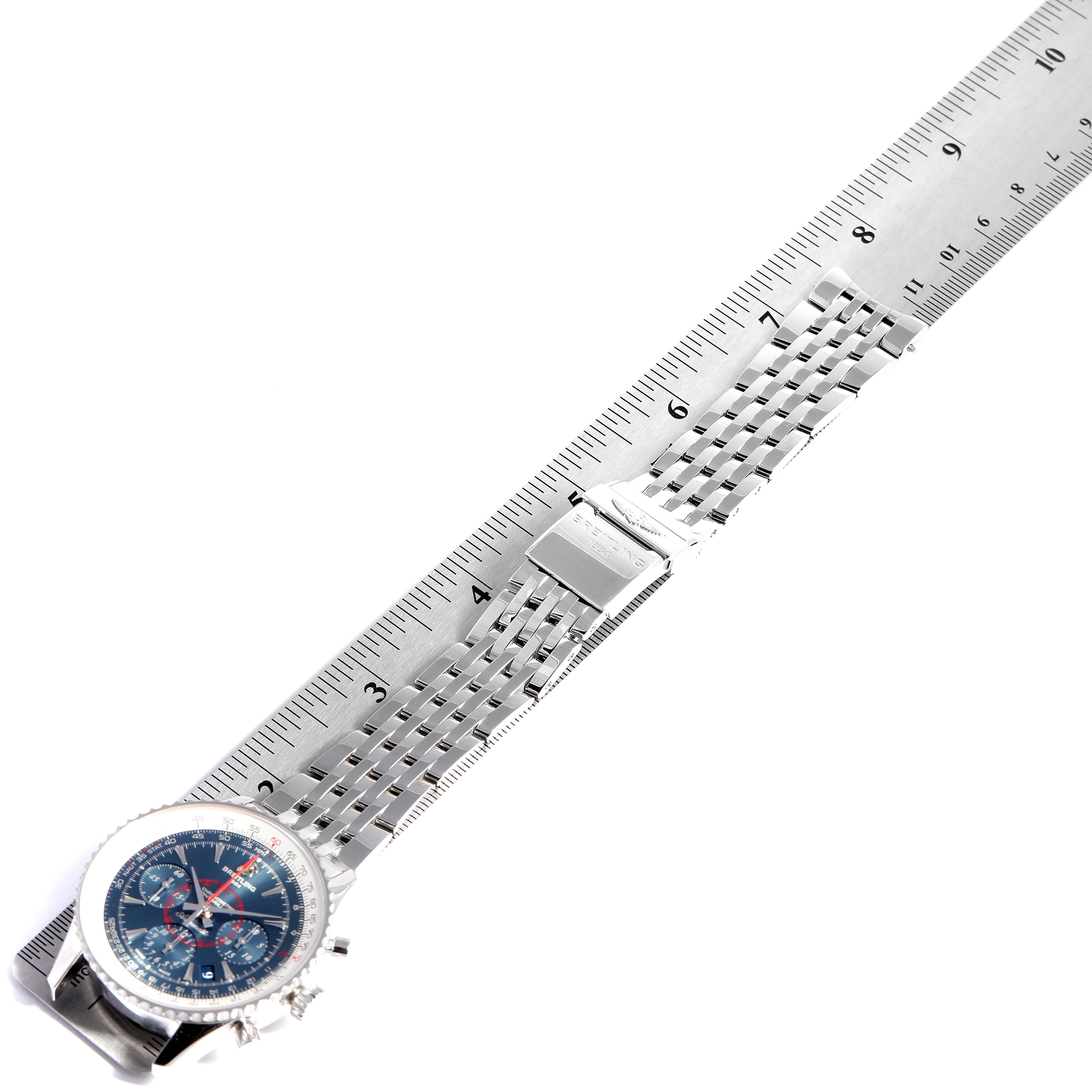 The image shows a Breitling Navitimer AB0130C5-C894-448A Men's Stainless Steel Blue Dial AB0130C5-C894-448A Men's Stainless Steel Blue Dial watch with a metal bracelet, placed next to a ruler measuring its length.