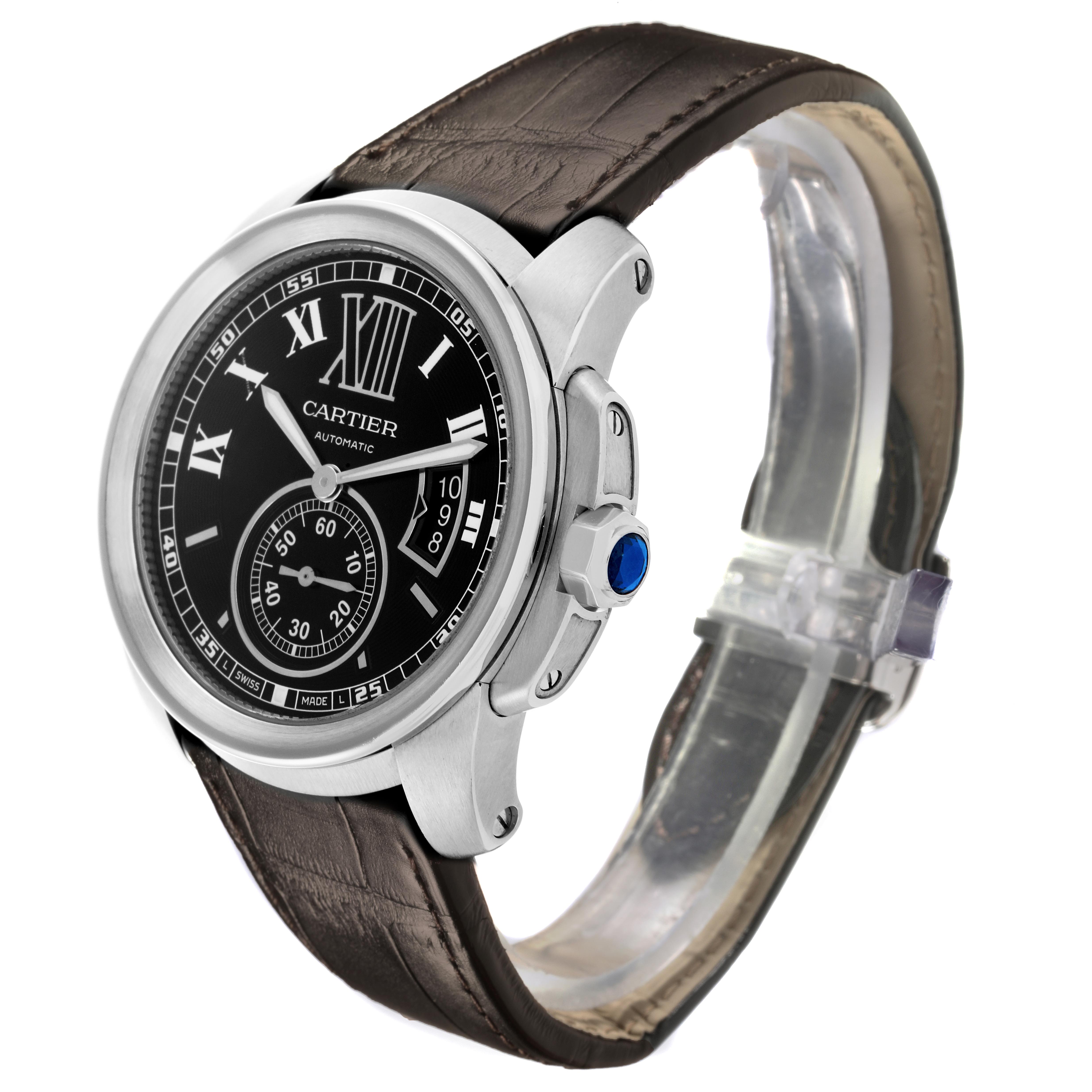 The Calibre de Cartier watch by Cartier is shown at a front angle, highlighting the dial, bezel, crown, and leather strap.