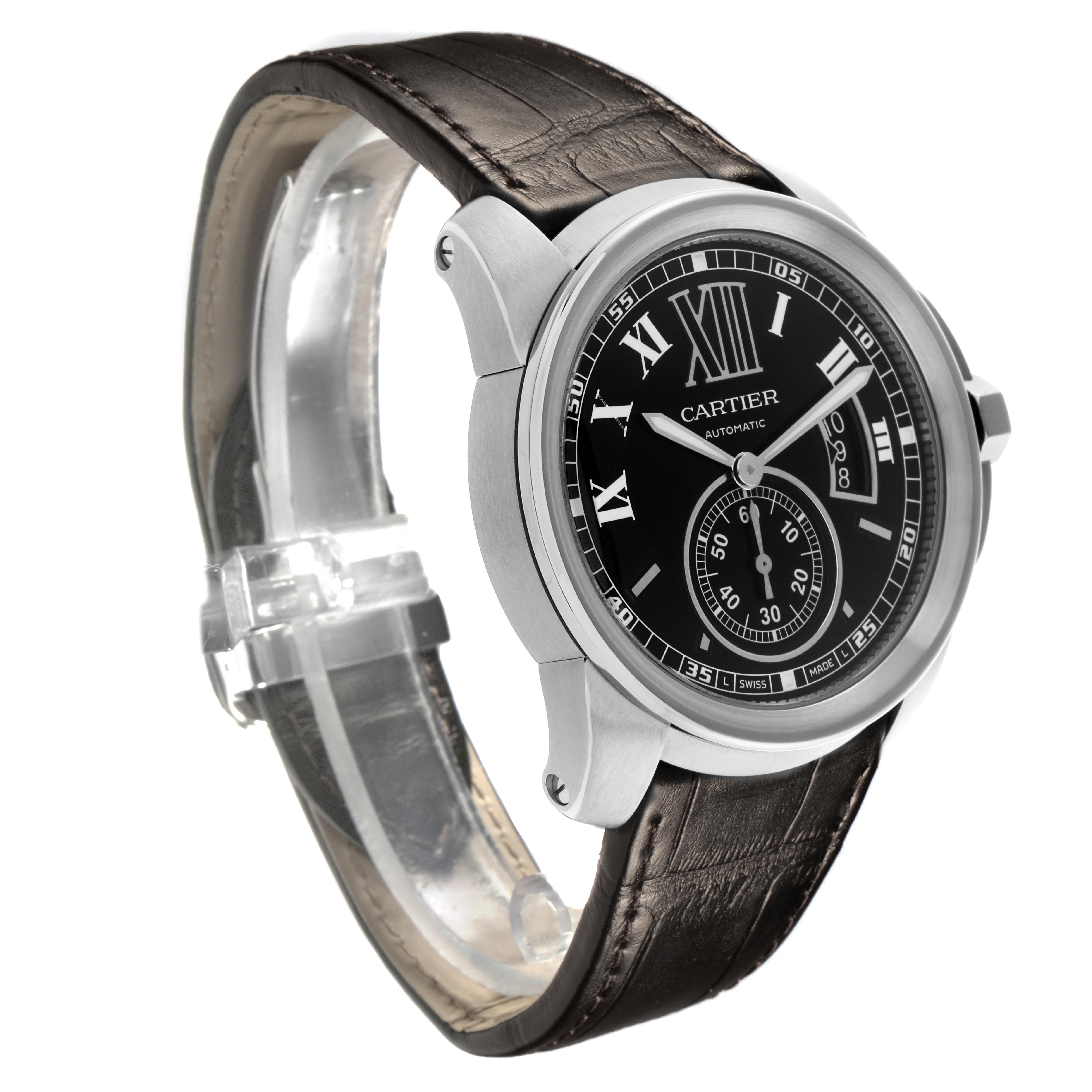 The Calibre de Cartier watch is shown at a front-left angle, displaying the dial, bezel, crown, and leather strap.