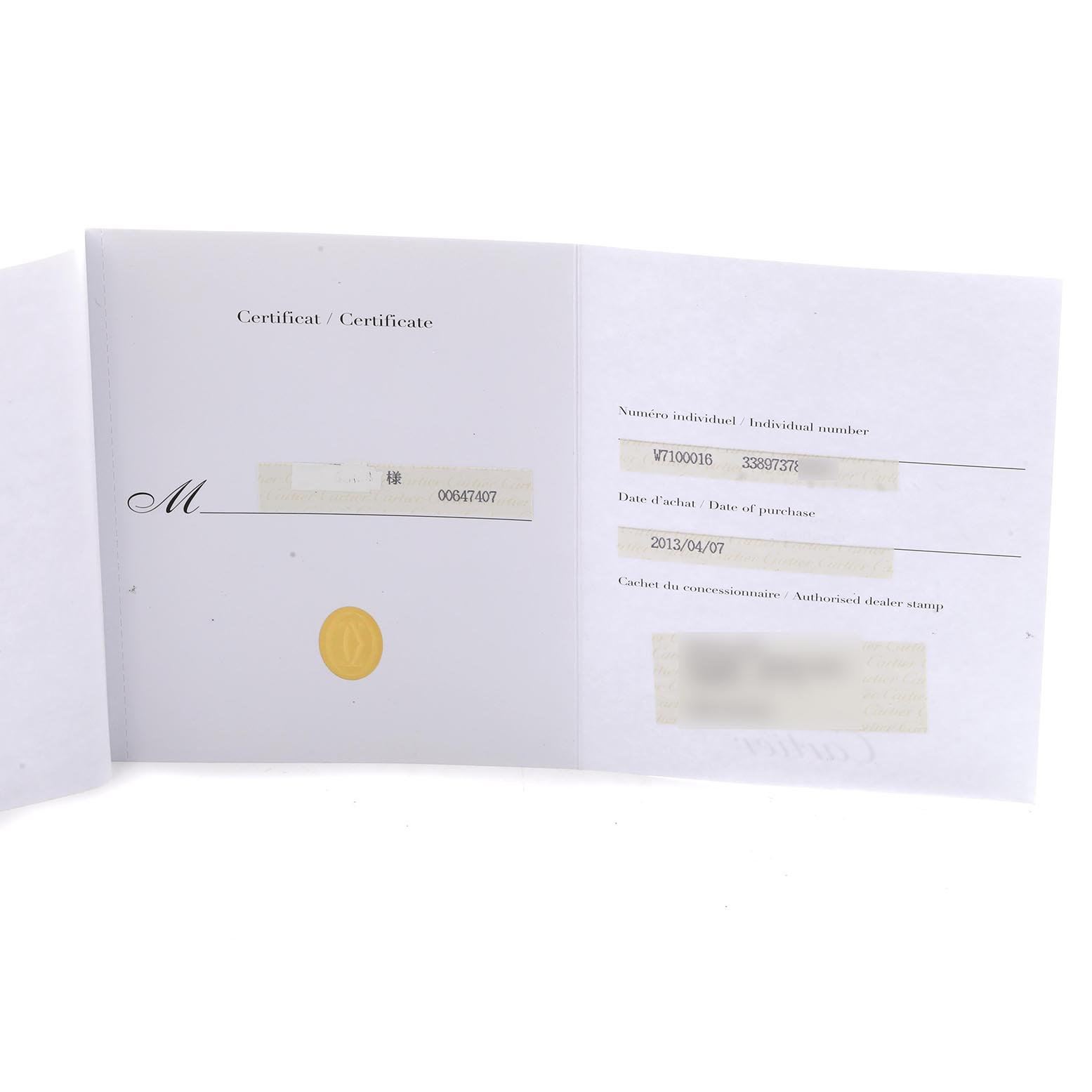 This image shows the authenticity certificate for the Calibre de Cartier watch by Cartier, displayed open on a flat surface.