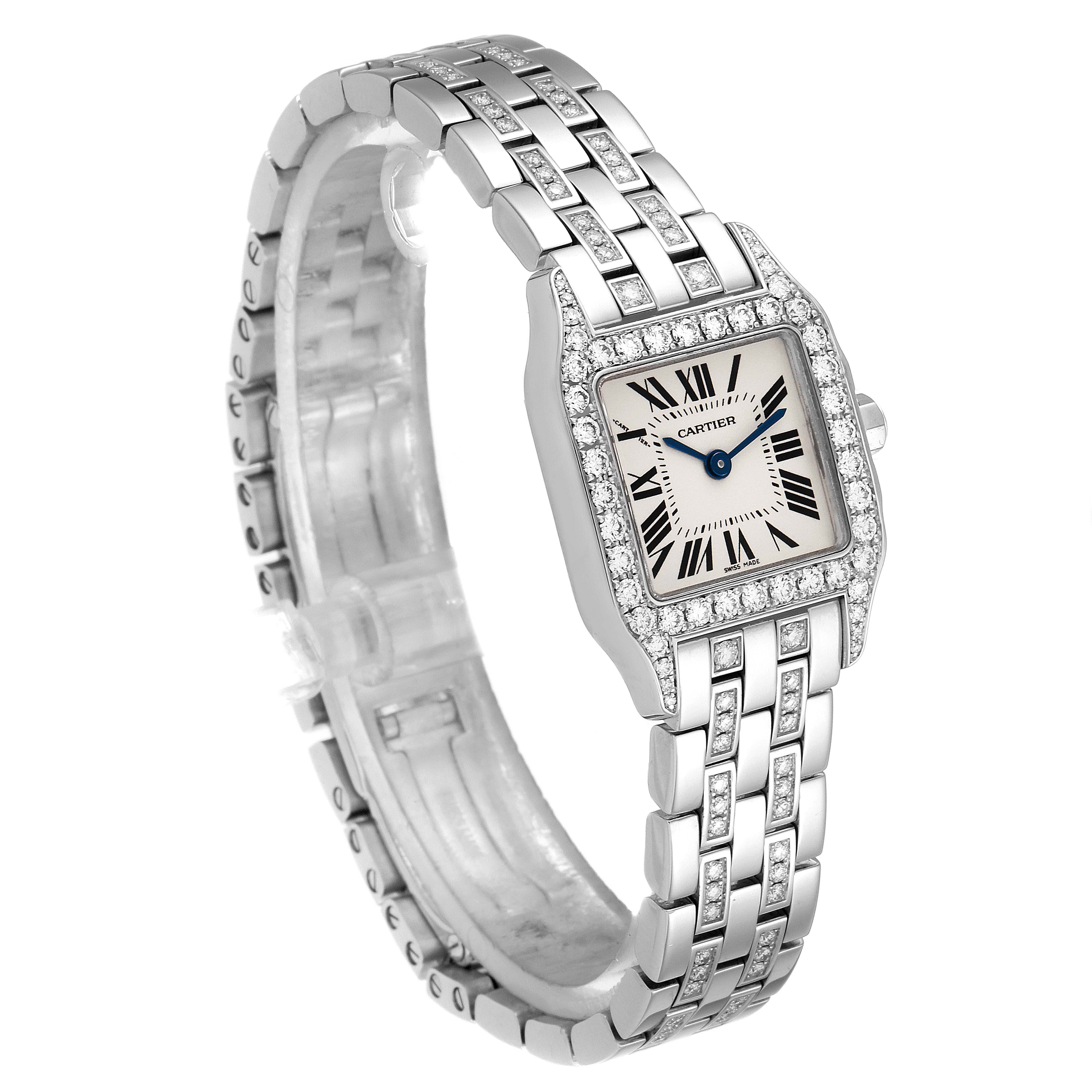 The Cartier Santos Demoiselle WF9003YC Women's White Gold Silver Dial WF9003YC Women's White Gold Silver Dial watch is shown at a three-quarter angle, displaying the face, bezel, and bracelet.