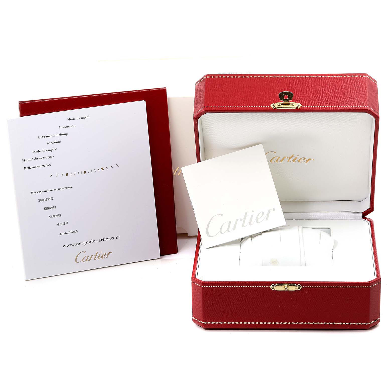 The image shows a red Cartier box for a Santos watch, along with the instruction manuals.