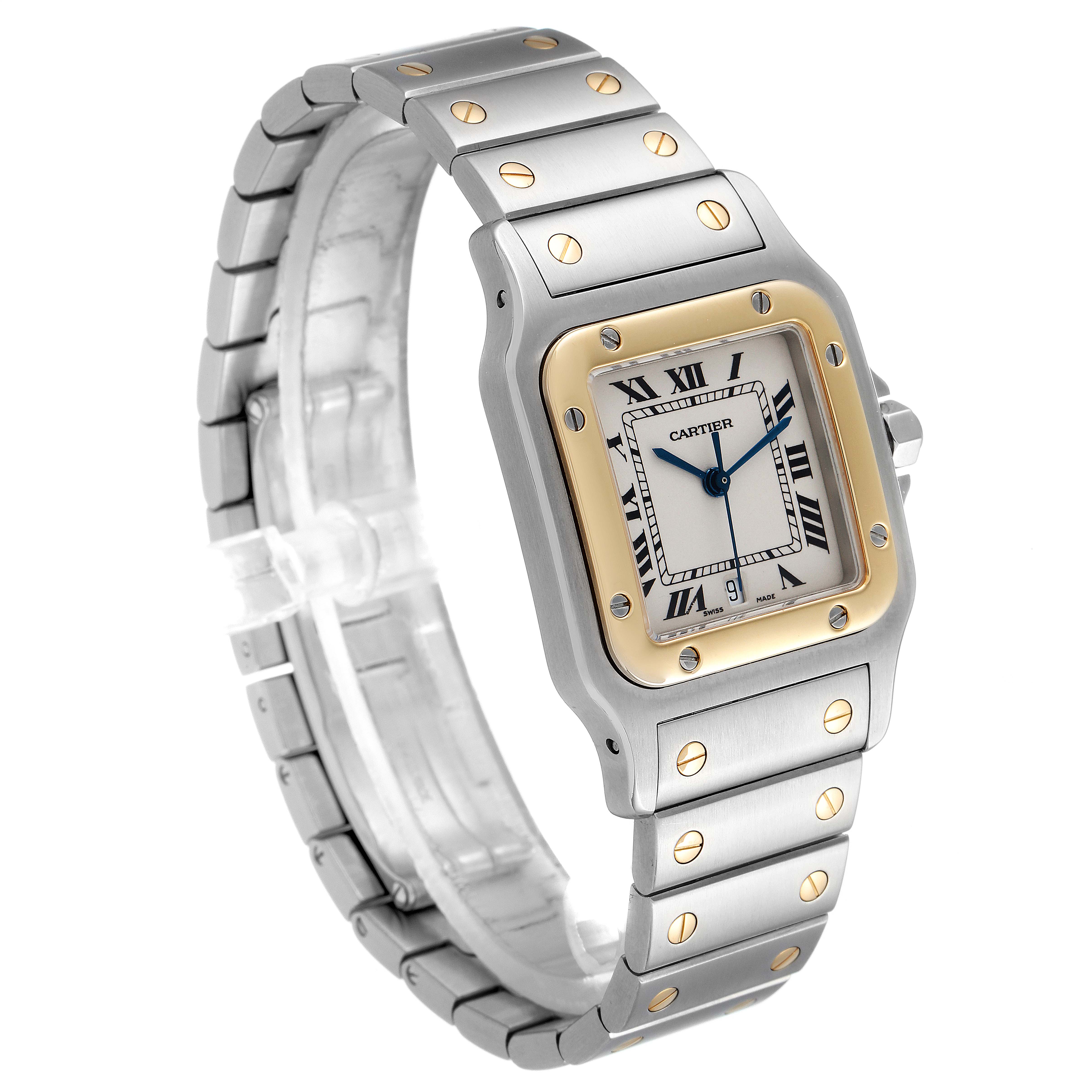 This image shows a Cartier Santos W20011C4 Men's Steel and Gold (two tone) Silver Dial W20011C4 Men's Steel and Gold (two tone) Silver Dial watch angled to display its face, bezel, and bracelet with screws.