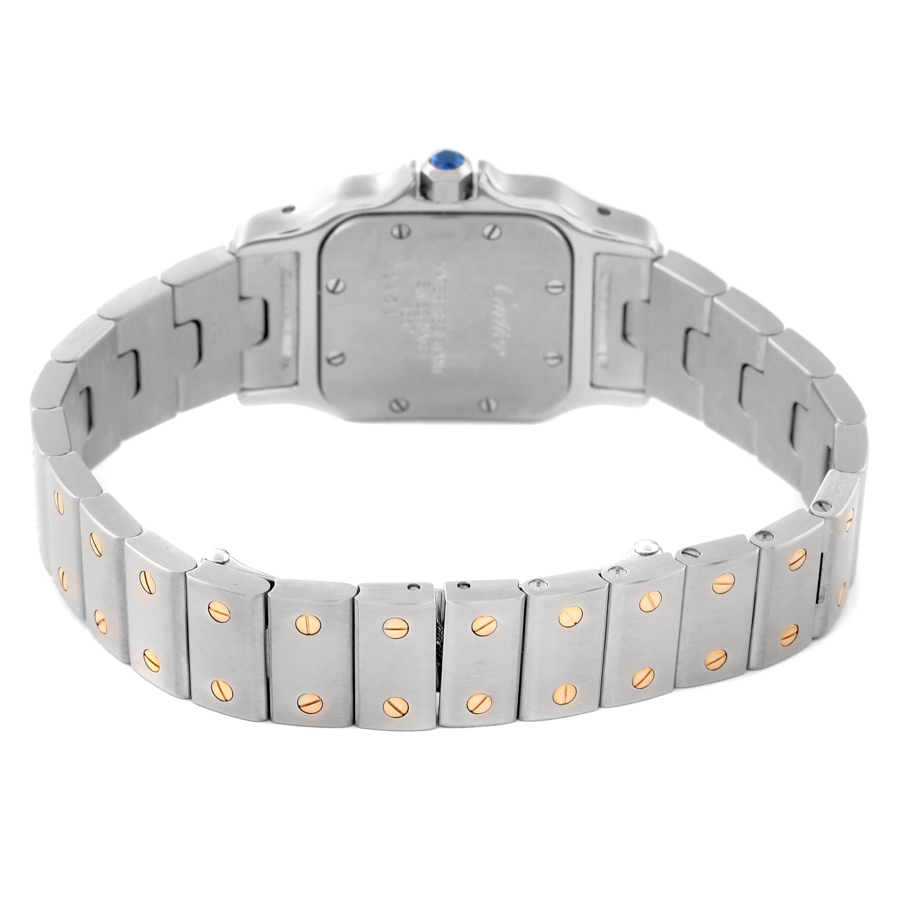 The image shows the back of the Santos model watch by Cartier, focusing on the bracelet and caseback.