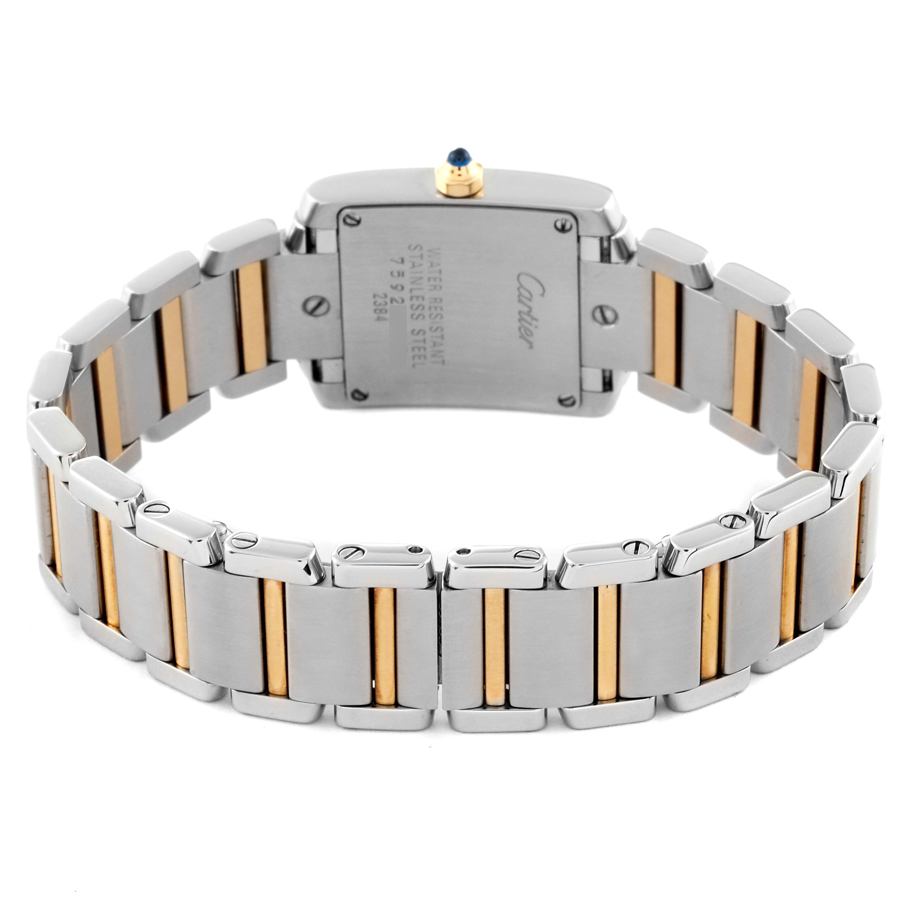 The image shows the back view of a Cartier Tank Francaise W51007Q4 Women's Stainless Steel Silver Dial W51007Q4 Women's Stainless Steel Silver Dial watch, highlighting its stainless steel and gold bracelet.