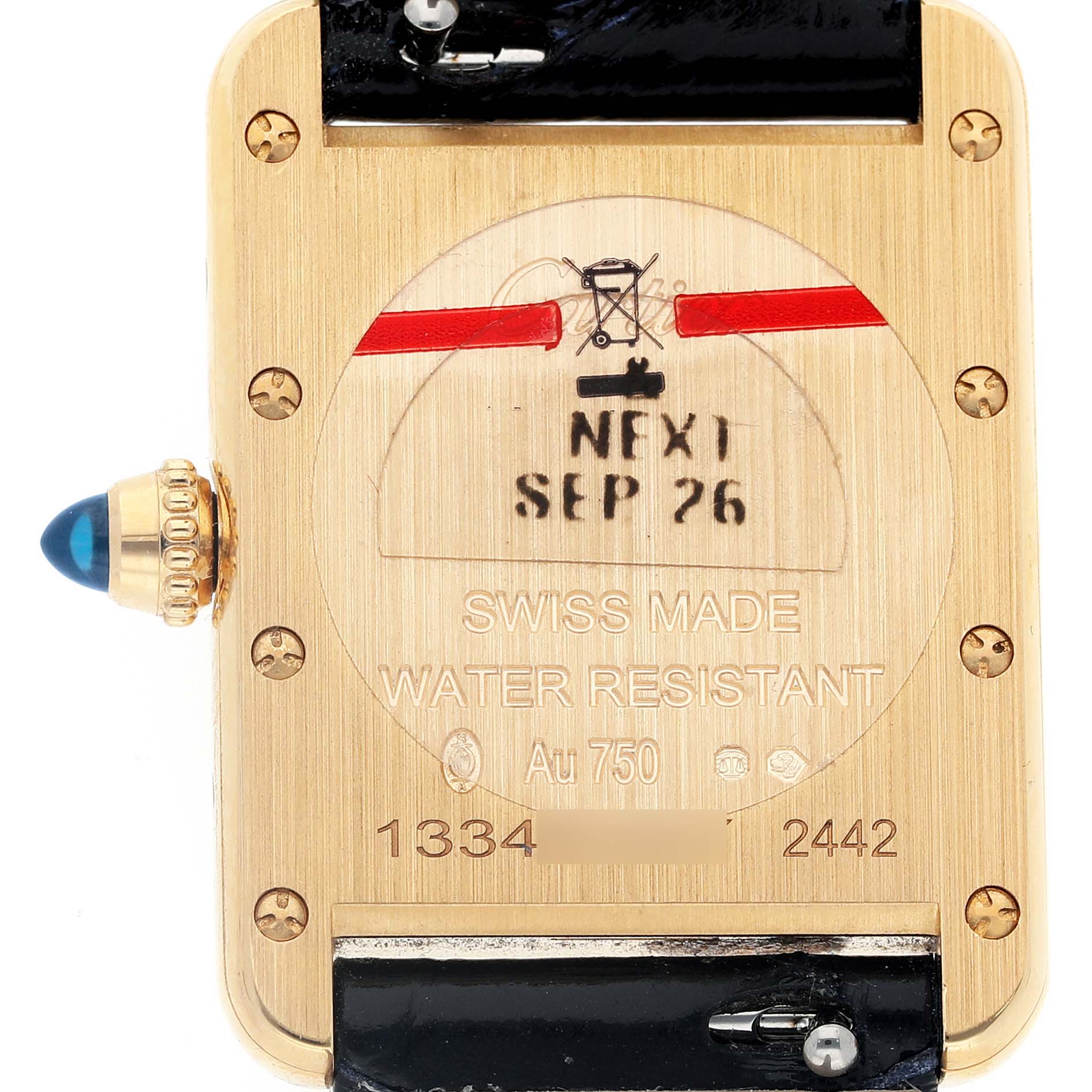 The image shows the back of a Cartier Tank Louis WGTA0342 Women's Yellow Gold Silver Dial watch, highlighting its markings and crown.