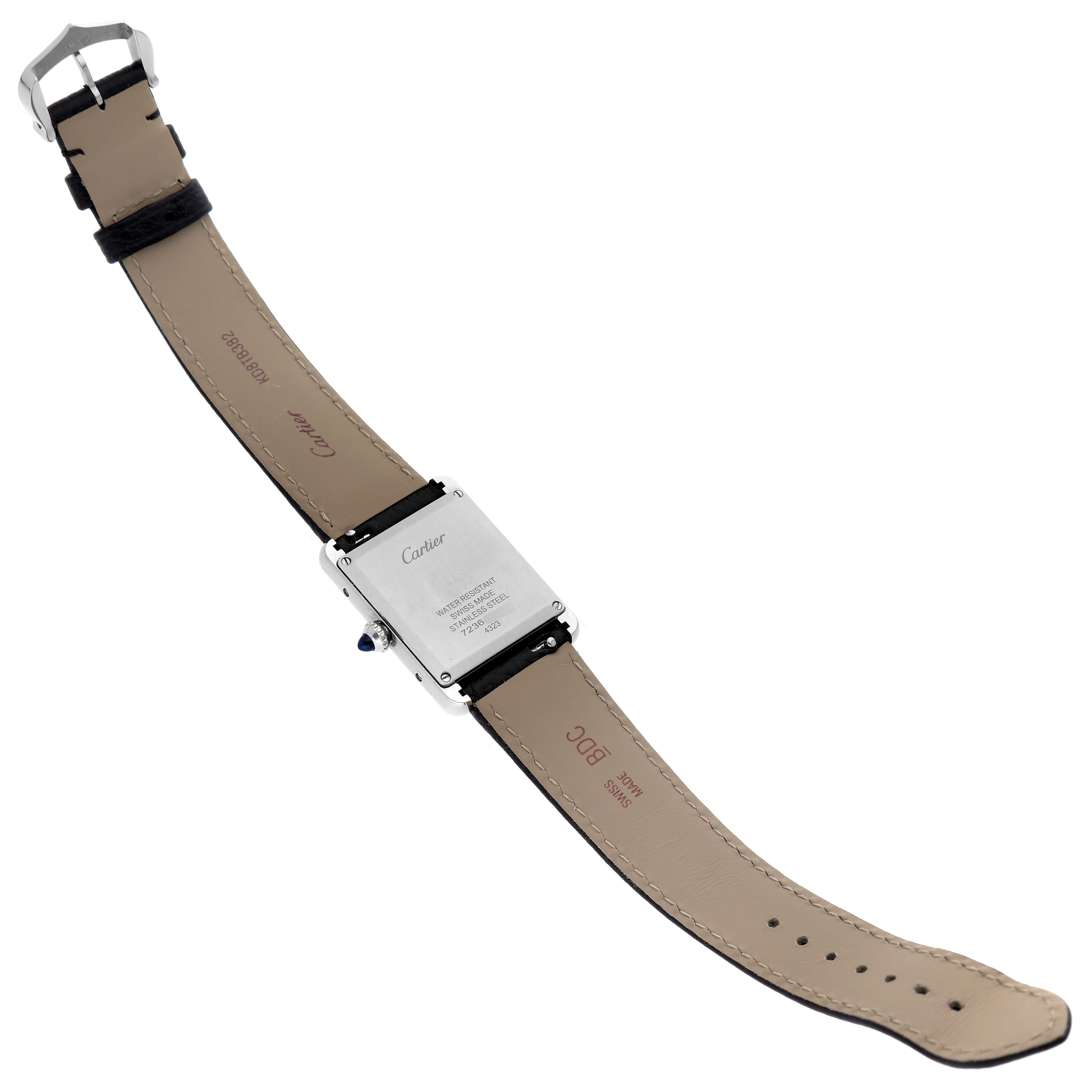 The image shows the back view of a Cartier Tank Must WSTA0041 Women's Stainless Steel Silver Dial WSTA0041 Women's Stainless Steel Silver Dial watch with its leather strap fully extended.