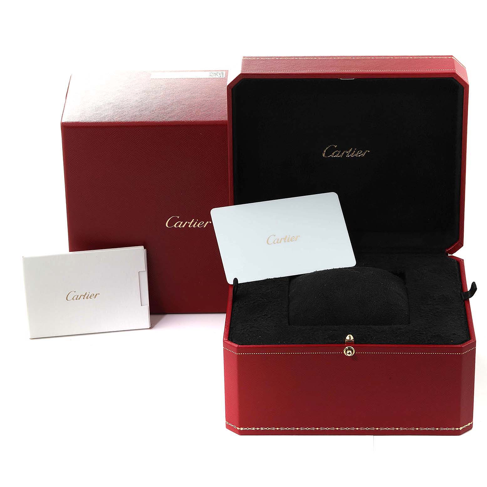 The image shows the packaging for a Cartier Tank Must WSTA0041 Women's Stainless Steel Silver Dial WSTA0041 Women's Stainless Steel Silver Dial watch, including a red box, inner case, and a booklet.