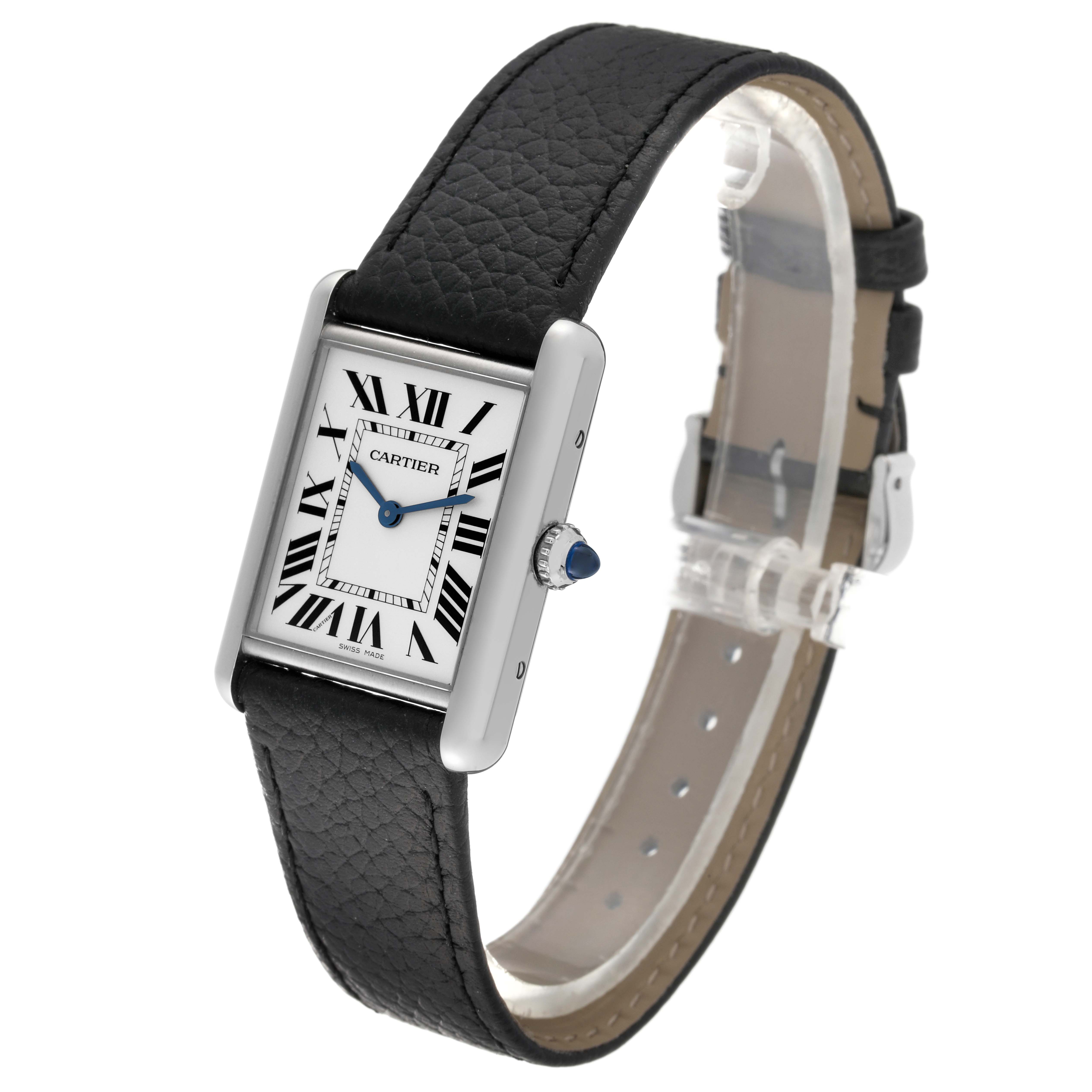 The Tank Must model by Cartier is shown at a slight angle, displaying its rectangular face, Roman numerals, and black leather strap.