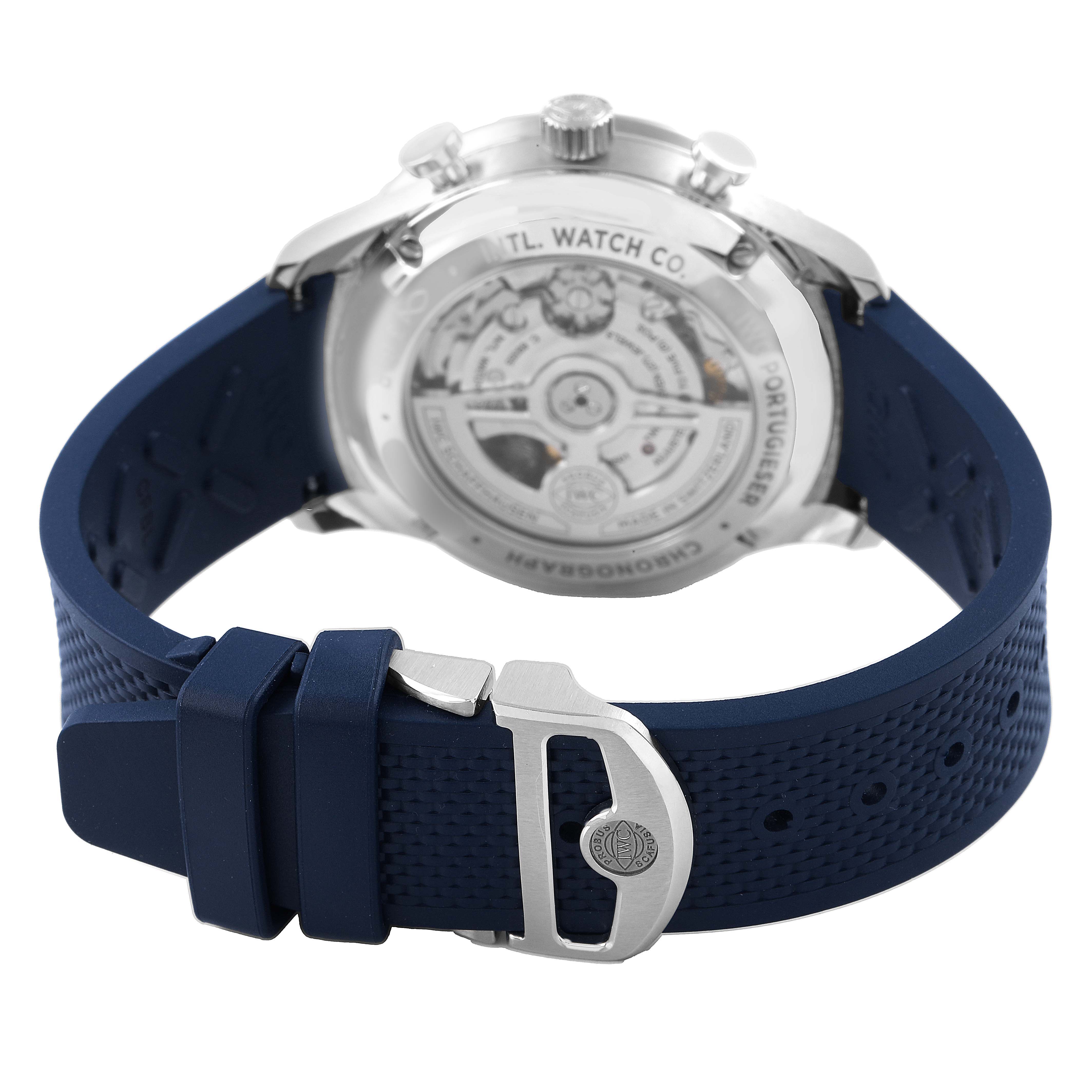 The IWC Portuguese IW371605 Men's Stainless Steel Silver Dial watch is shown from the back, highlighting its transparent case back and blue strap.