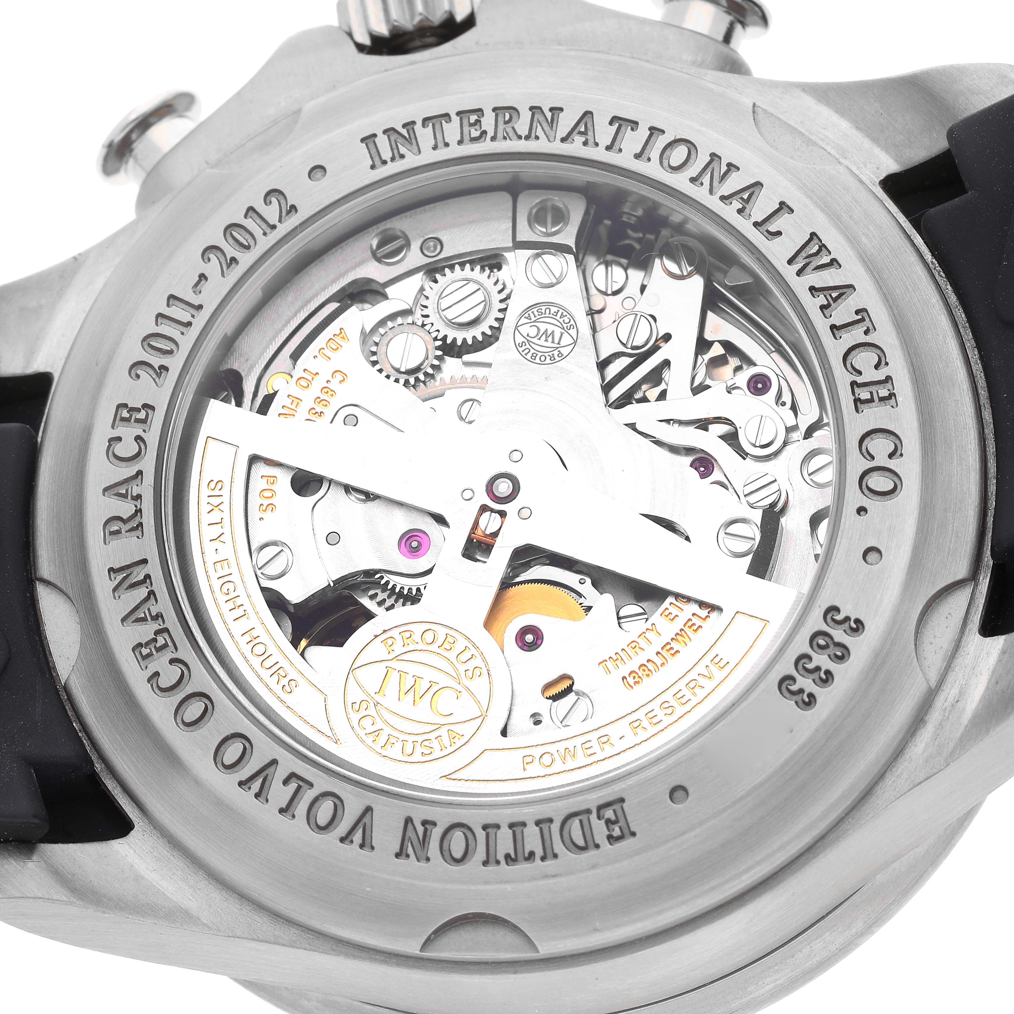 The image shows the back view of an IWC Portuguese IW390212 Men's Titanium Black Dial IW390212 Men's Titanium Black Dial model watch, revealing its intricate internal movement and engravings.