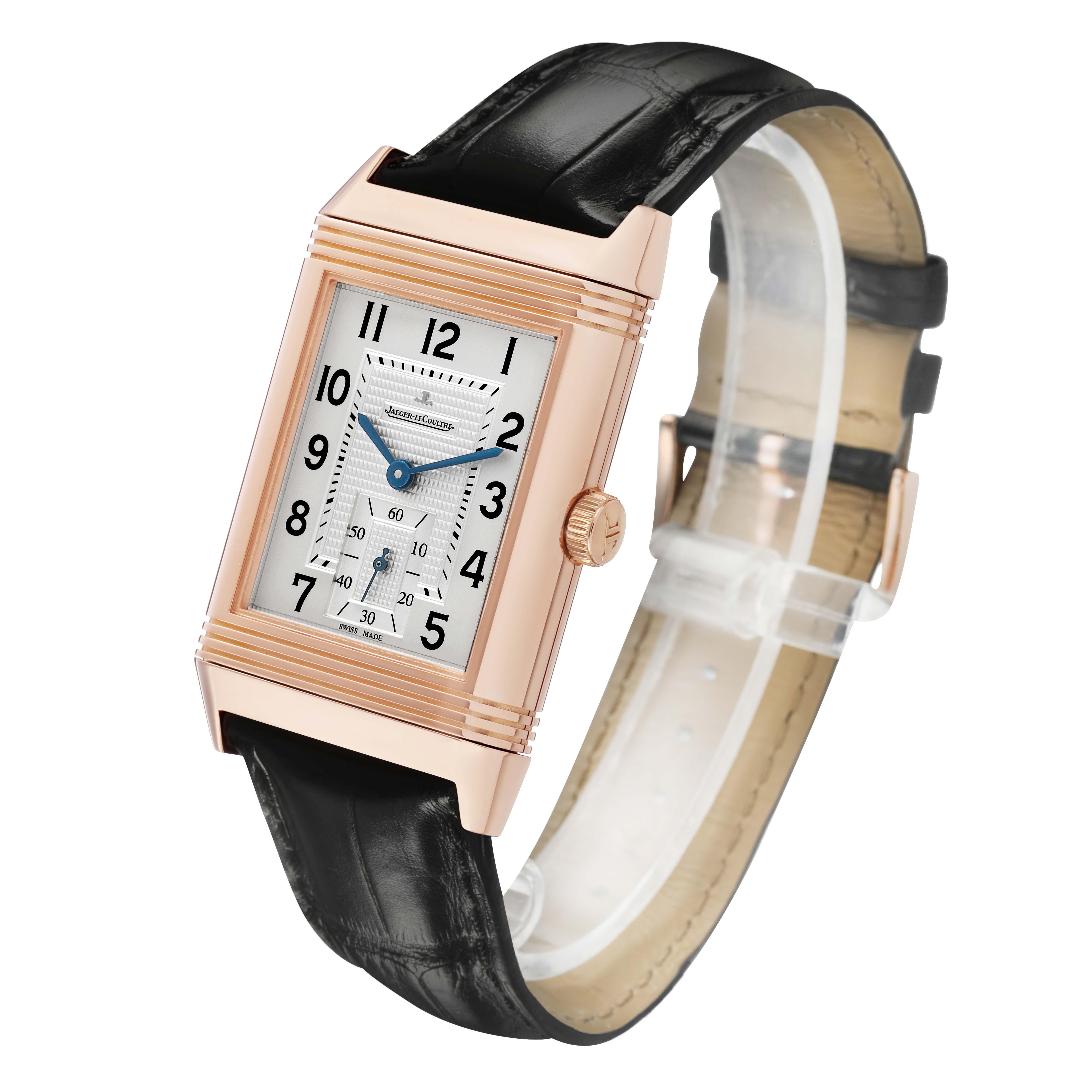 The Jaeger LeCoultre Reverso Q3732520 Men's Rose Gold Silver Dial watch is shown at a three-quarter angle, displaying the case, dial, hands, crown, and strap.