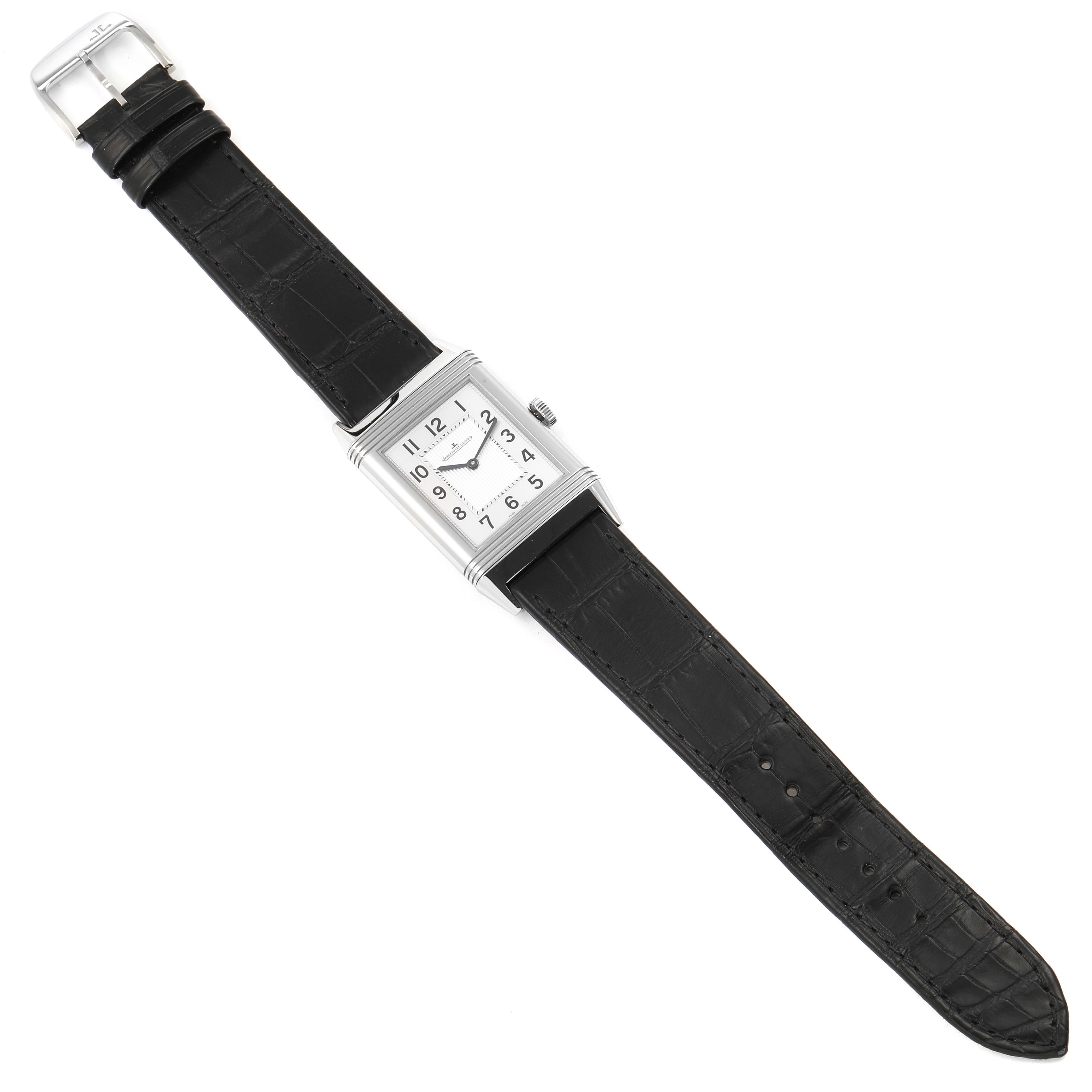 The image shows a Jaeger LeCoultre Reverso Q2788520 Men's Stainless Steel Silver Dial Q2788520 Men's Stainless Steel Silver Dial watch in a top-down angle, displaying the rectangular dial, case, crown, and black leather strap.