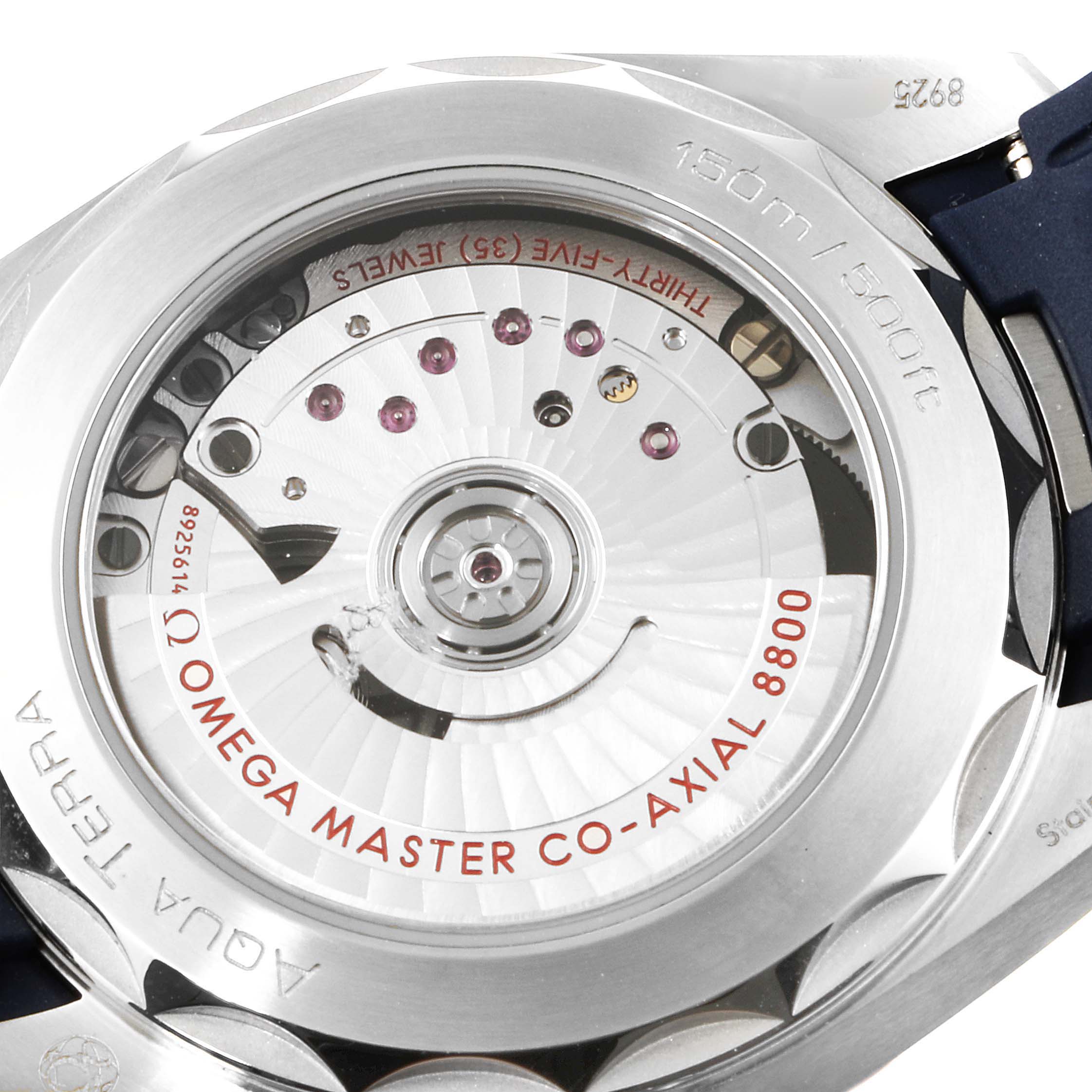 The image shows the open case back of the Omega Aqua Terra 220.12.38.20.03.001 Men
s Stainless Steel Blue Dial 220.12.38.20.03.001 Men
s Stainless Steel Blue Dial watch, revealing the movement inside.