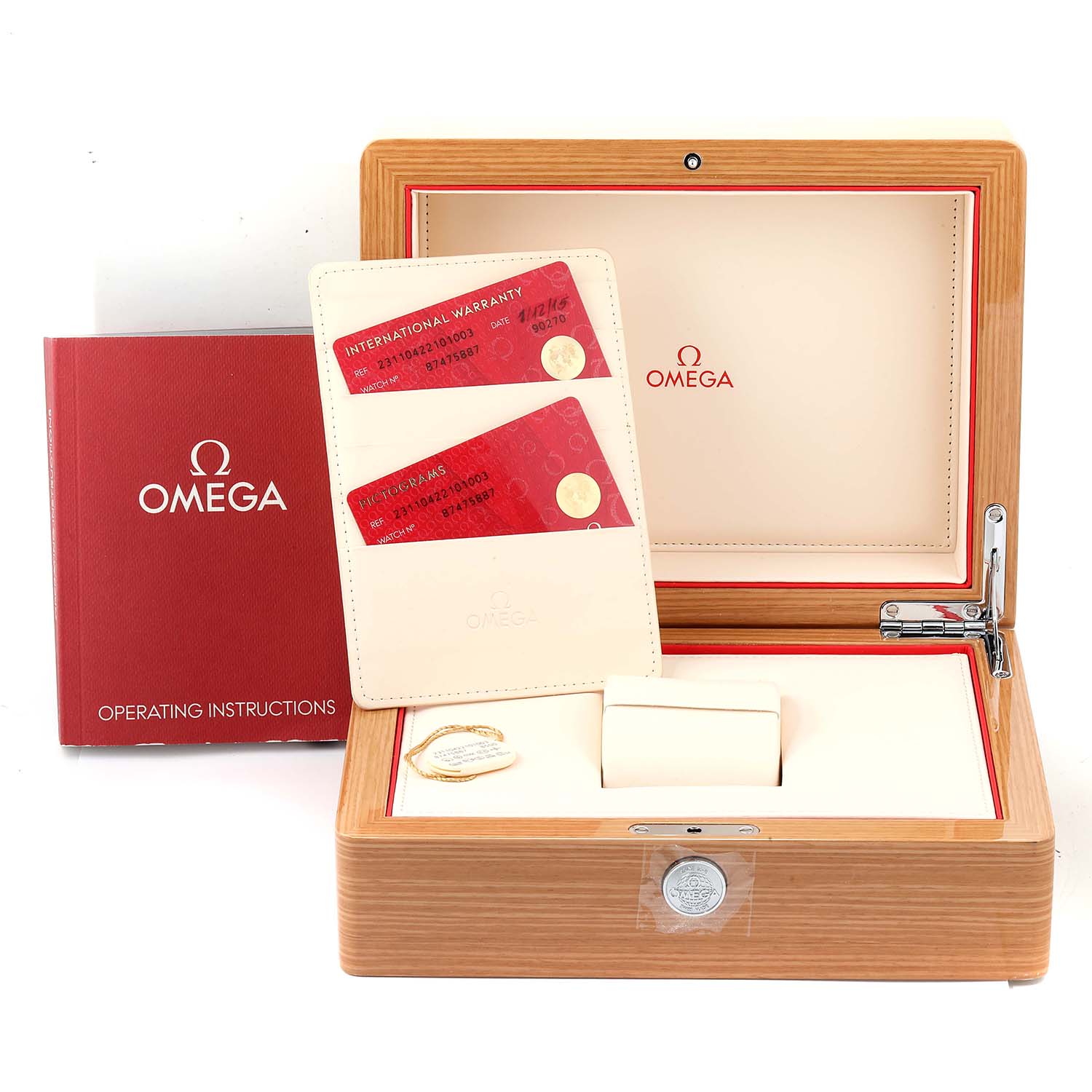 The image shows the Omega Aqua Terra 231.10.42.21.01.003 Men
s Stainless Steel Black Dial 231.10.42.21.01.003 Men
s Stainless Steel Black Dial watch packaging box, warranty cards, and operating instructions booklet.
