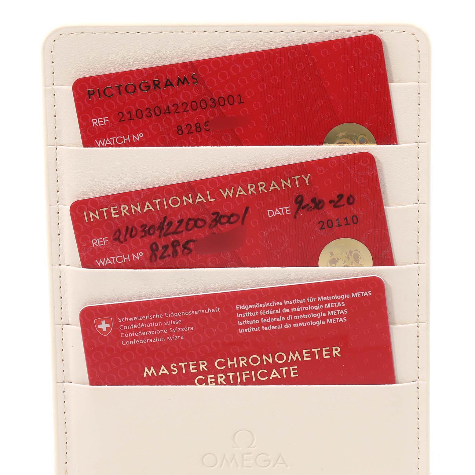 The image shows International Warranty, Pictograms, and Master Chronometer Certificate cards for the Omega Seamaster 210.30.42.20.03.001 Men
s Stainless Steel Blue Dial 210.30.42.20.03.001 Men
s Stainless Steel Blue Dial model.