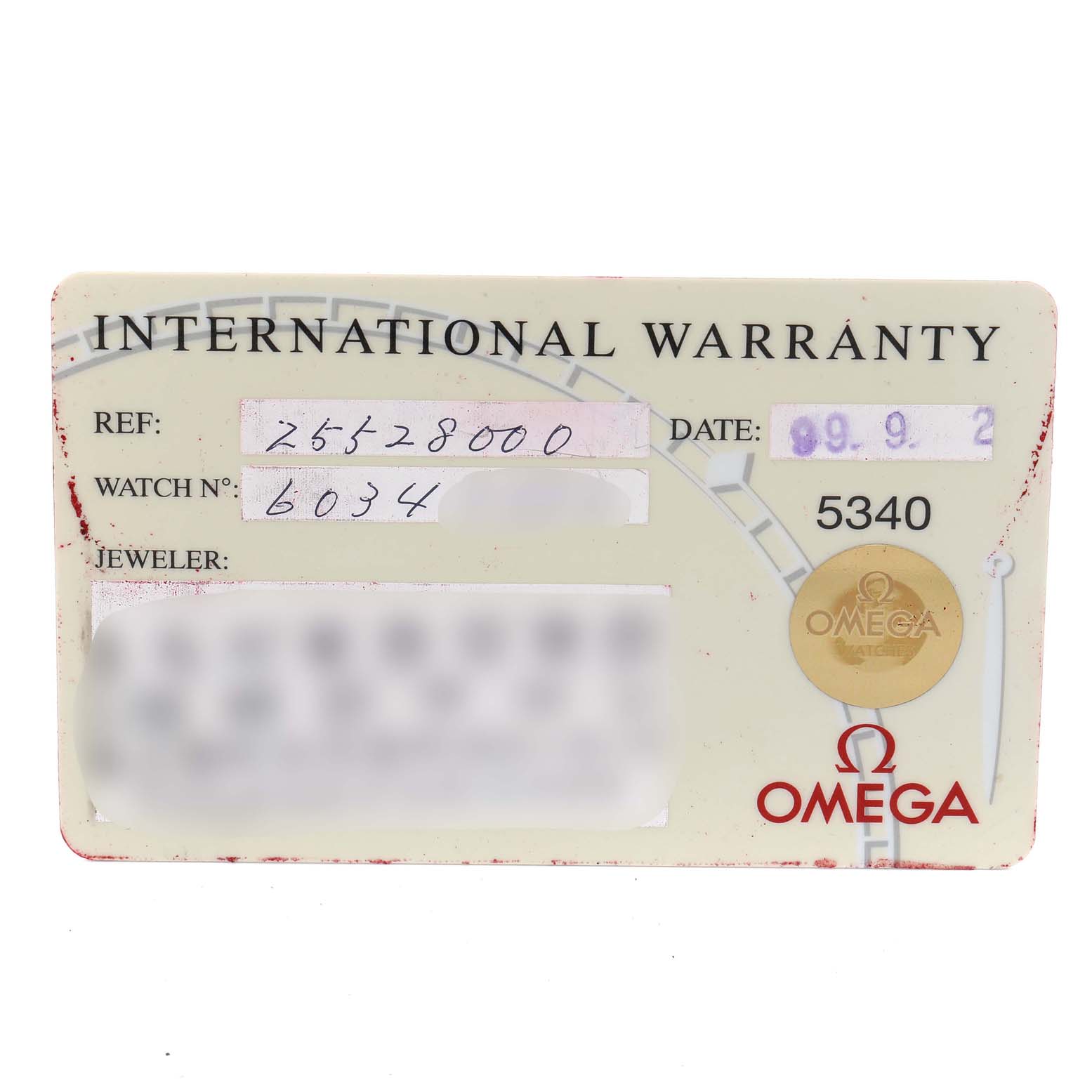 This image shows an international warranty card with handwritten details for the Omega Seamaster 2552.80.00 Men
s Stainless Steel Blue Dial 2552.80.00 Men
s Stainless Steel Blue Dial model.
