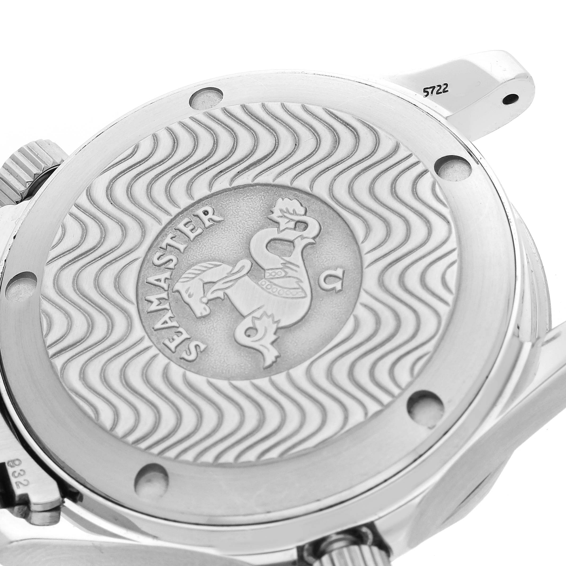 The image shows the case back of an Omega Seamaster 2263.80.00 Men
s Stainless Steel Blue Dial 2263.80.00 Men
s Stainless Steel Blue Dial, featuring the engraved logo and wave pattern, viewed from a slightly angled perspective.