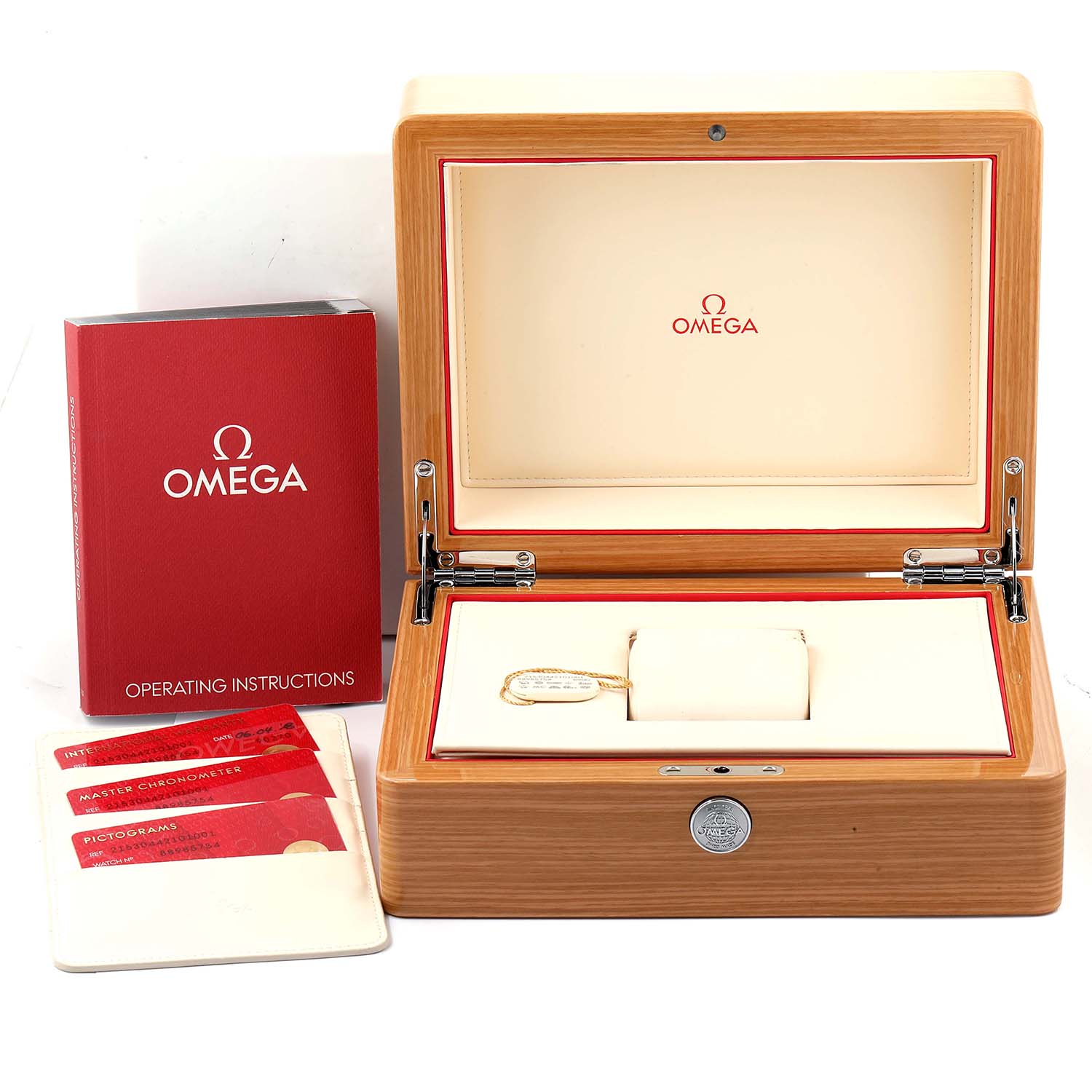 The image shows the Omega Planet Ocean 215.30.44.21.01.001 Men
s Stainless Steel Black Dial 215.30.44.21.01.001 Men
s Stainless Steel Black Dial watch box, operating instructions, and identification cards from an overhead angle.