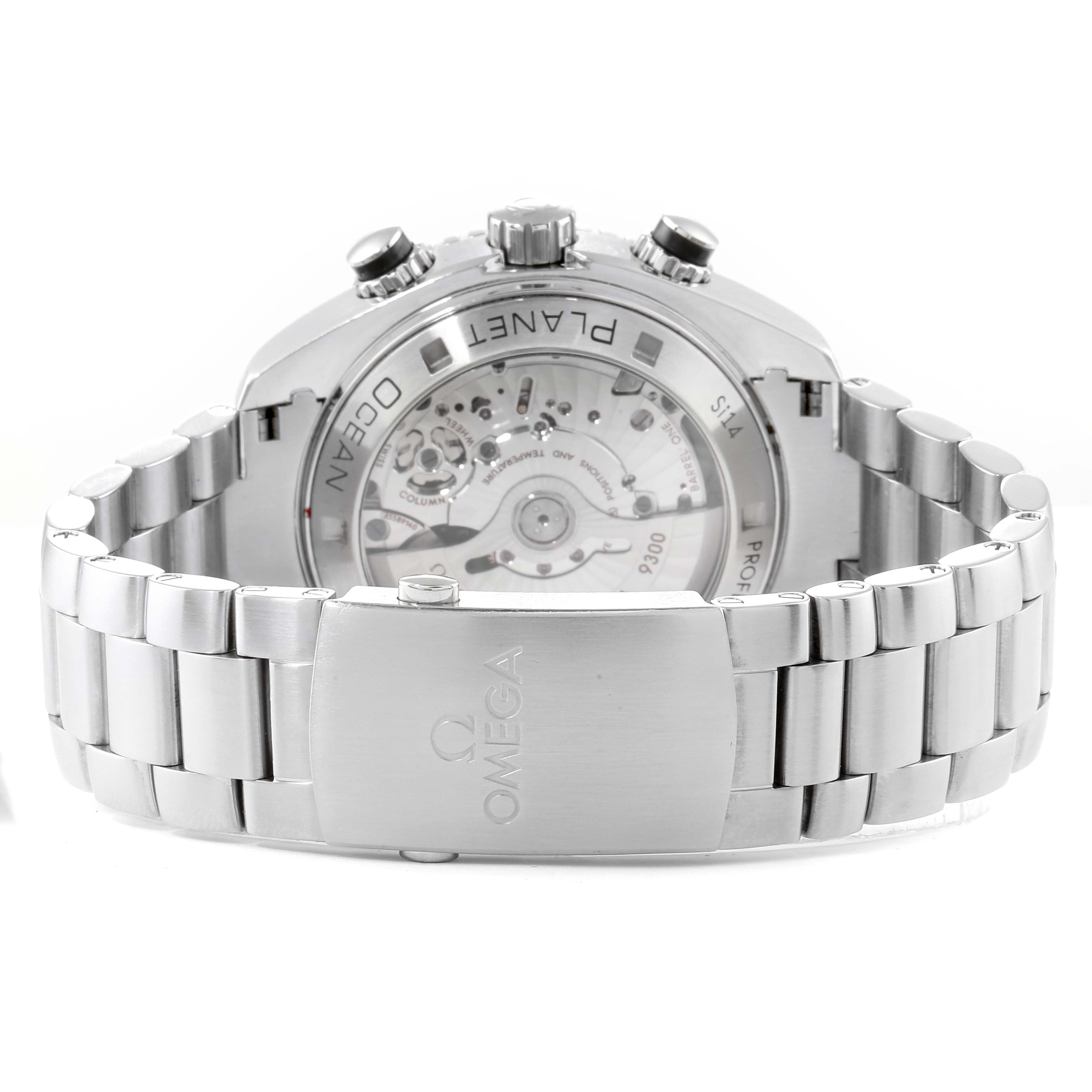 The image shows the back view of an Omega Planet Ocean 232.30.46.51.01.003  Men
s Stainless Steel Black Dial 232.30.46.51.01.003  Men
s Stainless Steel Black Dial watch, highlighting its transparent case back and stainless steel bracelet.