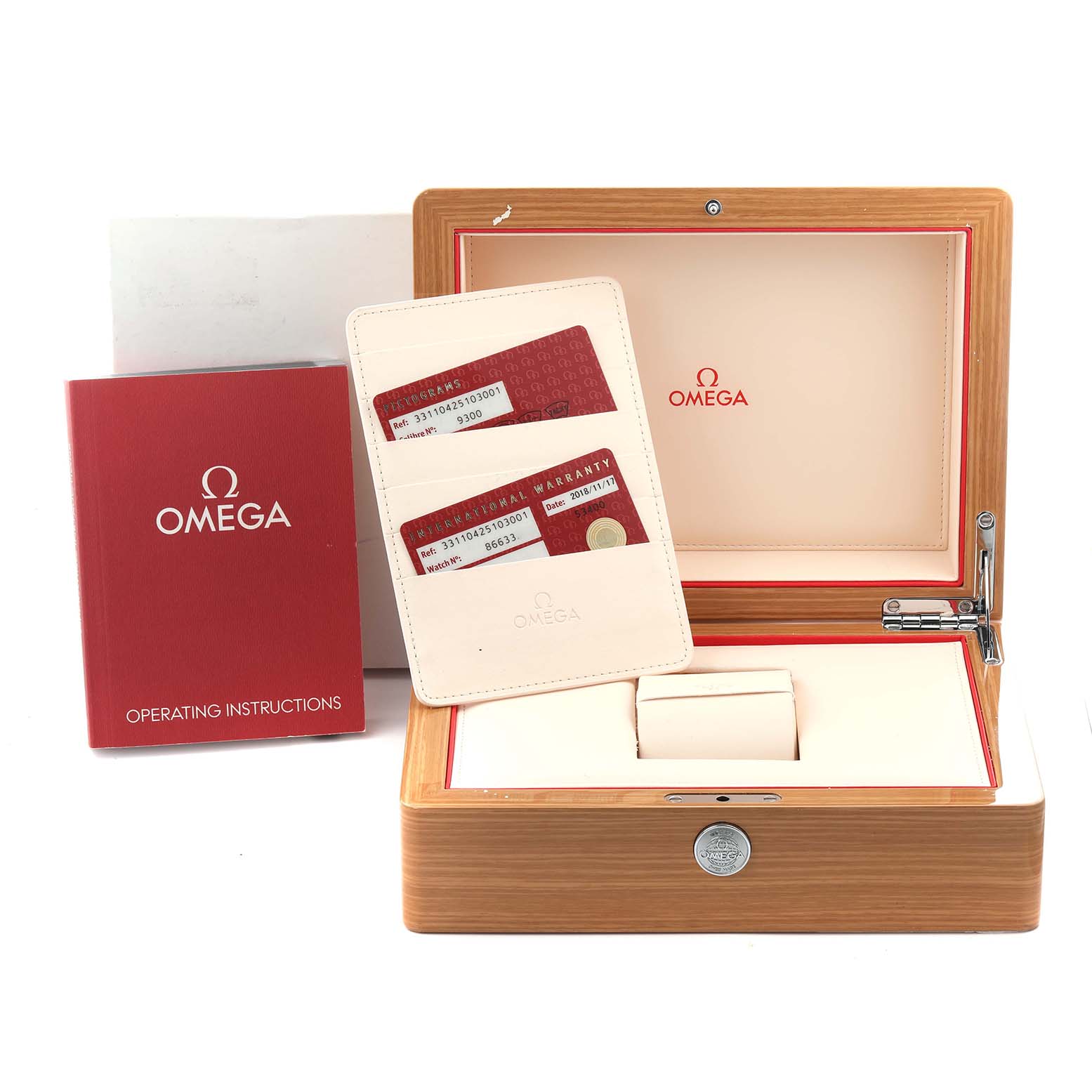 The image shows an Omega Speedmaster 331.10.42.51.03.001 Men's Stainless Steel Blue Dial 331.10.42.51.03.001 Men's Stainless Steel Blue Dial watch box set including the box, warranty cards, and an operating instructions booklet, viewed from the front.