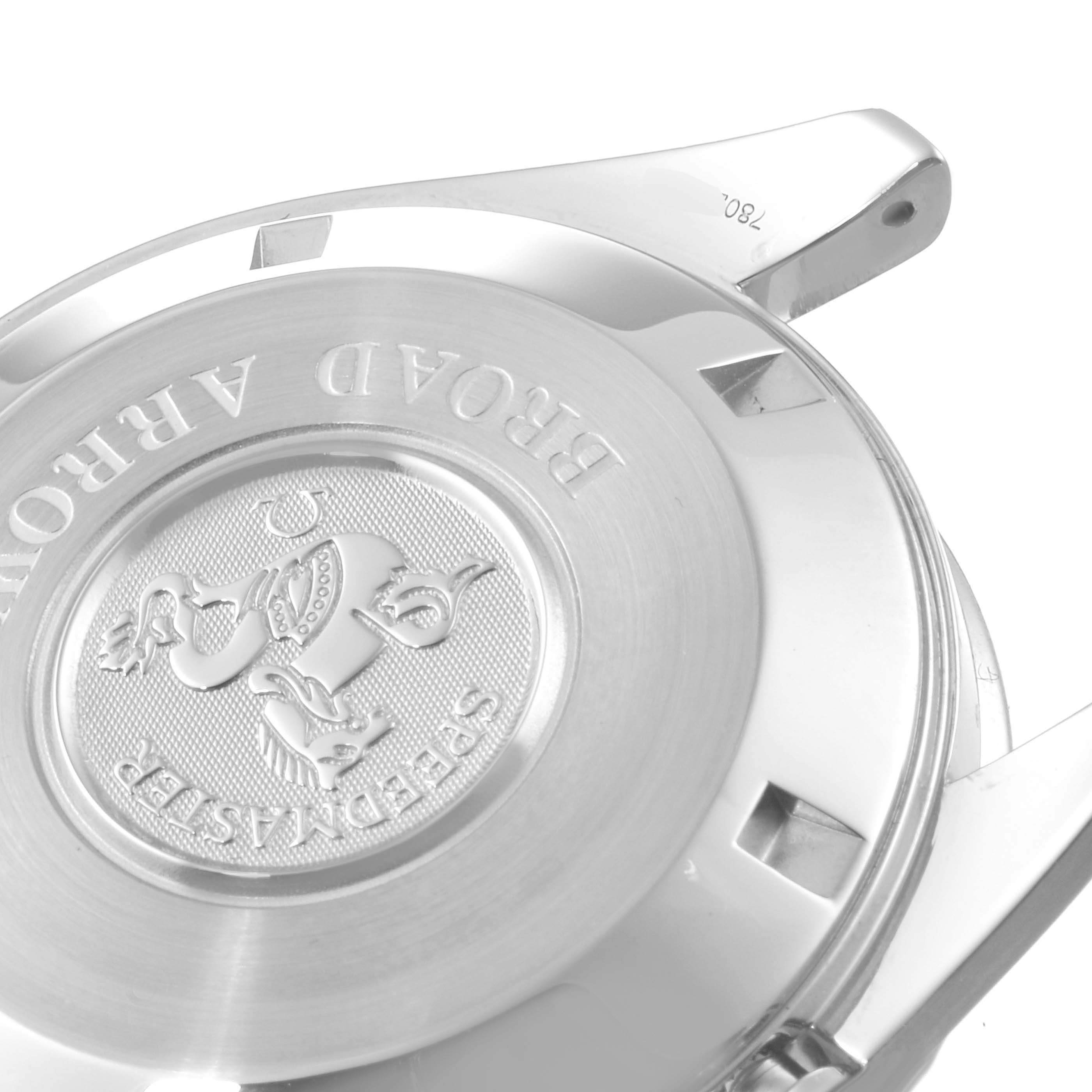 This image shows the back case of the Omega Speedmaster 3551.20.00 Men
s Stainless Steel White Dial 3551.20.00 Men
s Stainless Steel White Dial watch, highlighting the engraved emblem and text.