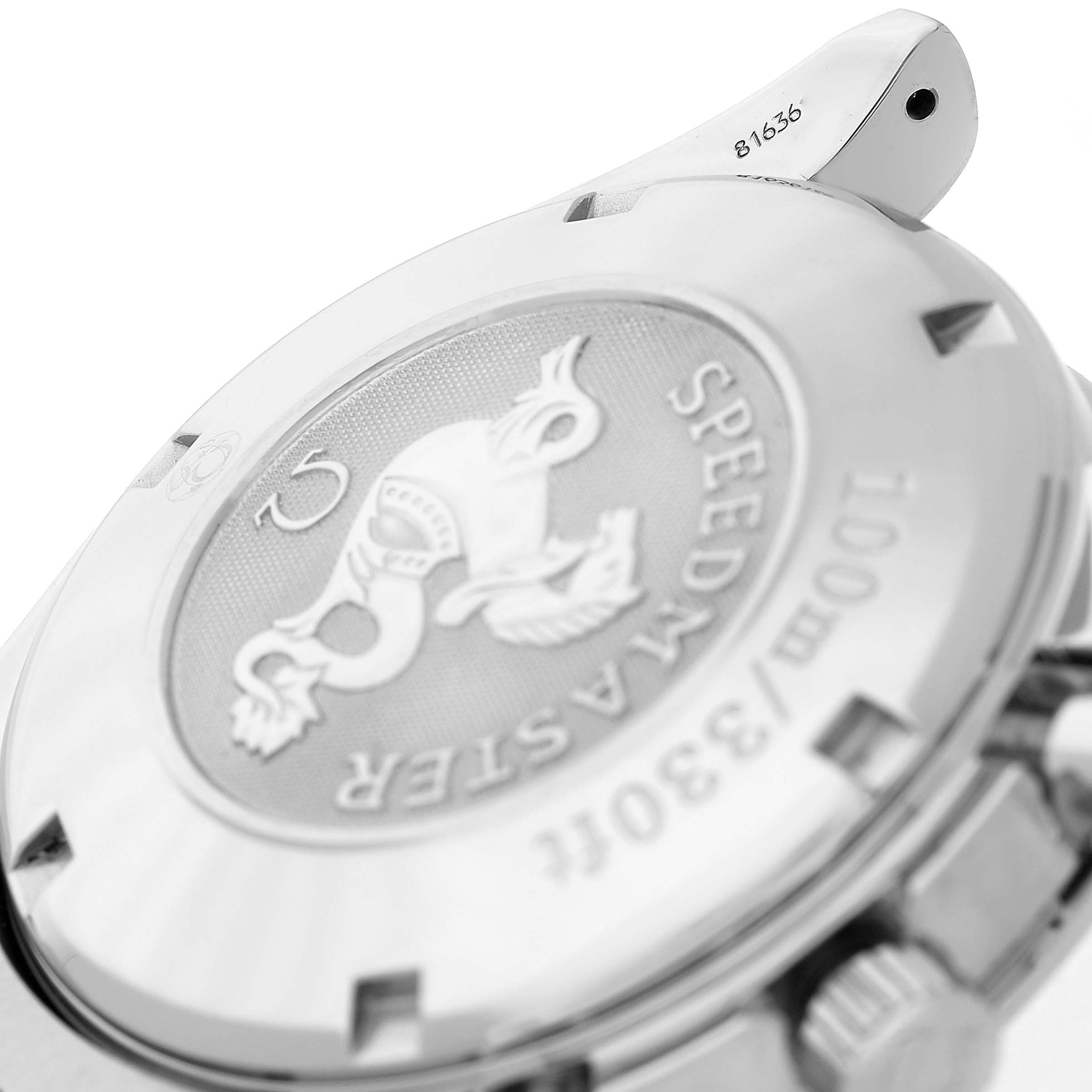 The image shows the case back of an Omega Speedmaster 3221.30.00 Men's Stainless Steel Silver Dial, highlighting its engravings and the edge of the crown.