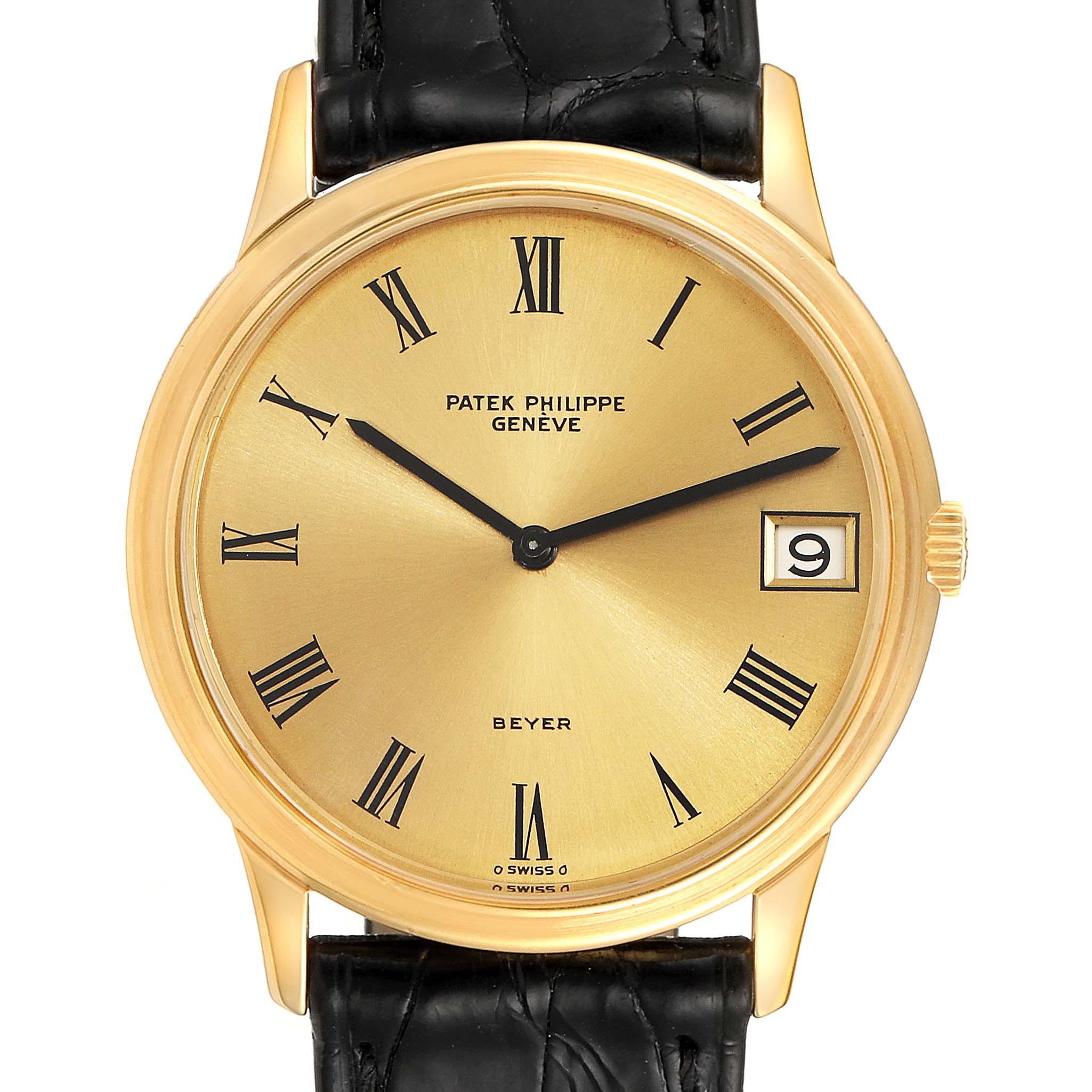The image shows a front angle of a Patek Philippe Calatrava 3593 Men's Yellow Gold Champagne Dial 3593 Men's Yellow Gold Champagne Dial watch, highlighting the dial, hour markers, and date window.