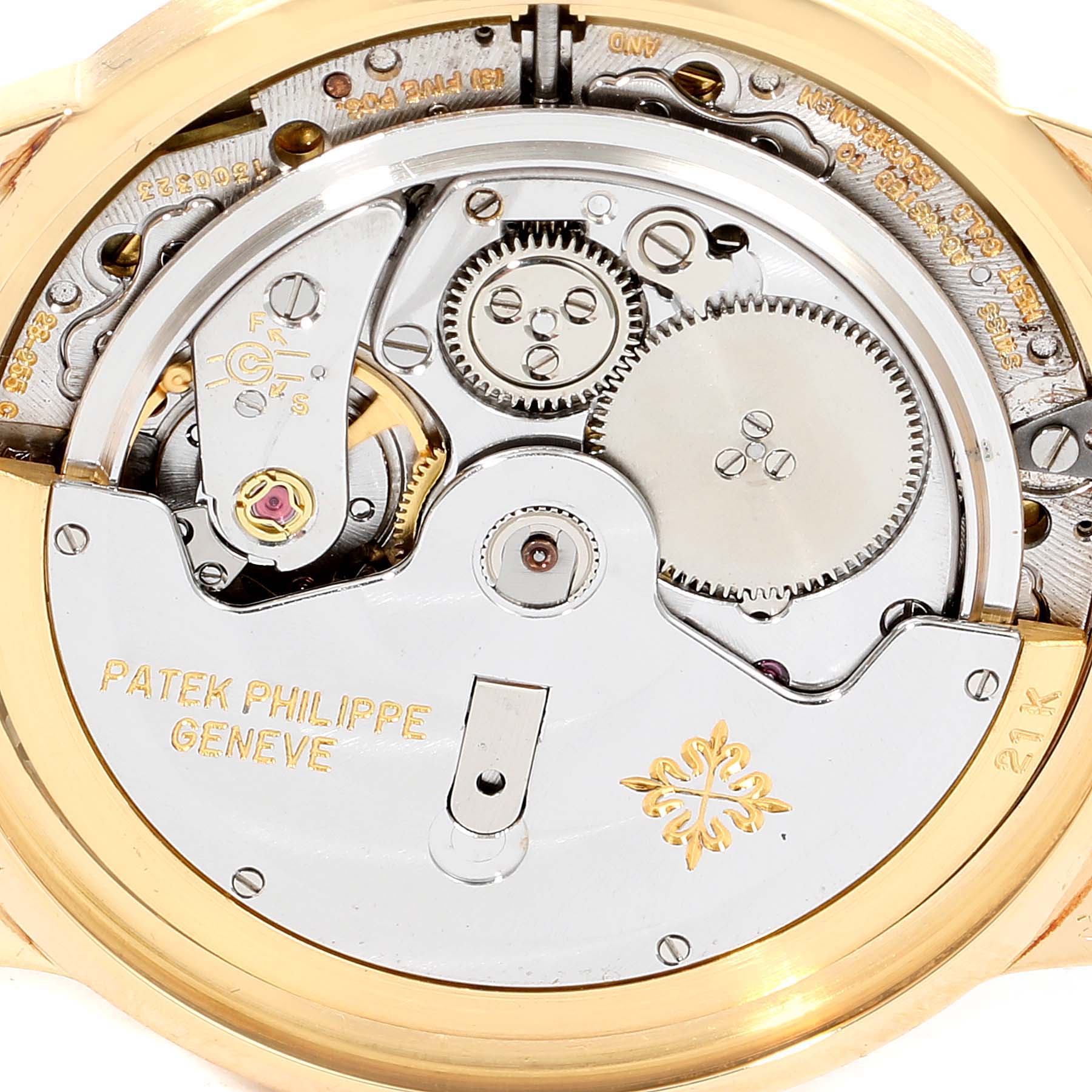 This image shows a close-up view of the movement mechanism from the back of a vintage Patek Philippe watch.