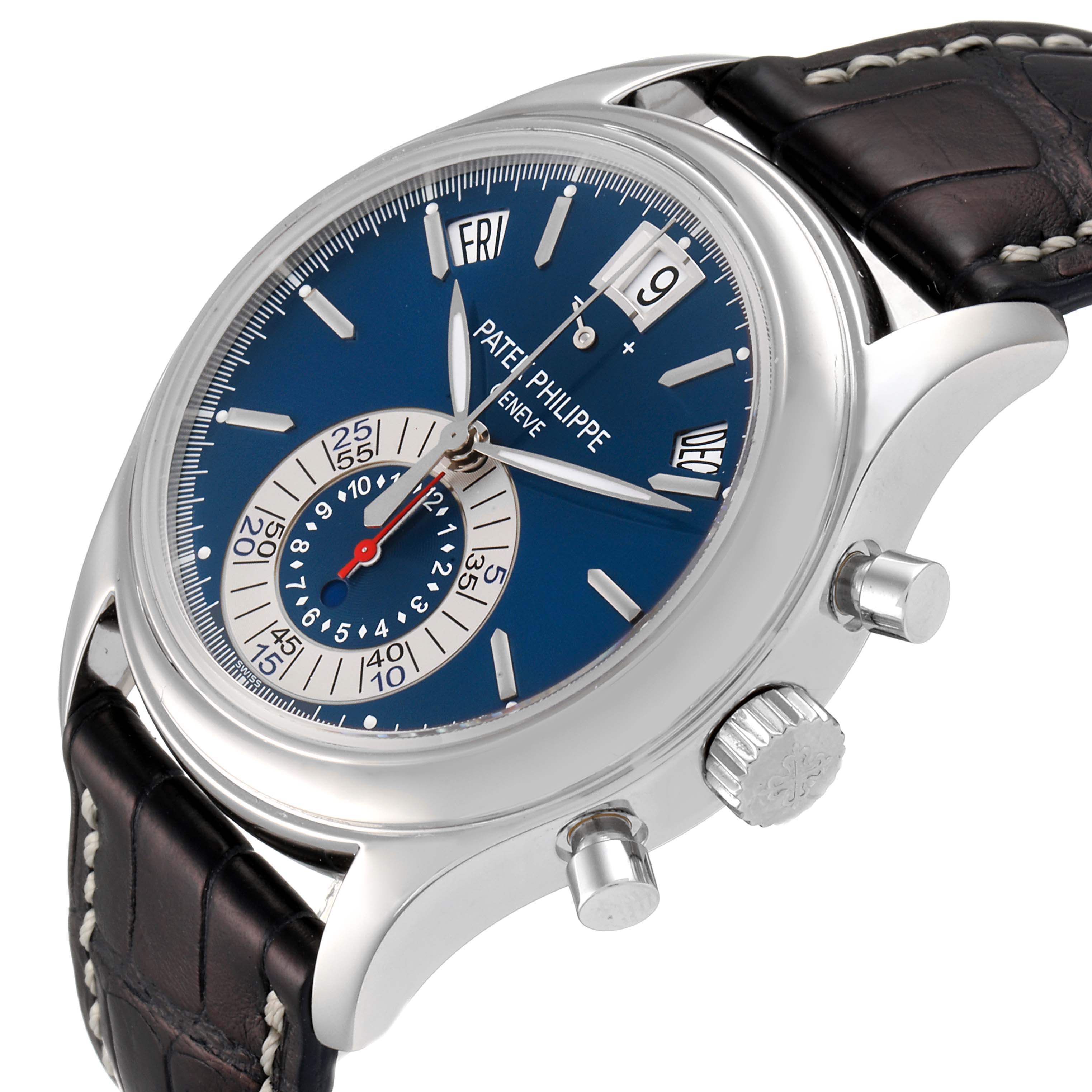 The image shows a Patek Philippe Complications 5960/01G Men's White Gold Blue Dial 5960/01G Men's White Gold Blue Dial model watch from an angled side view, highlighting the face, crown, and pushers.