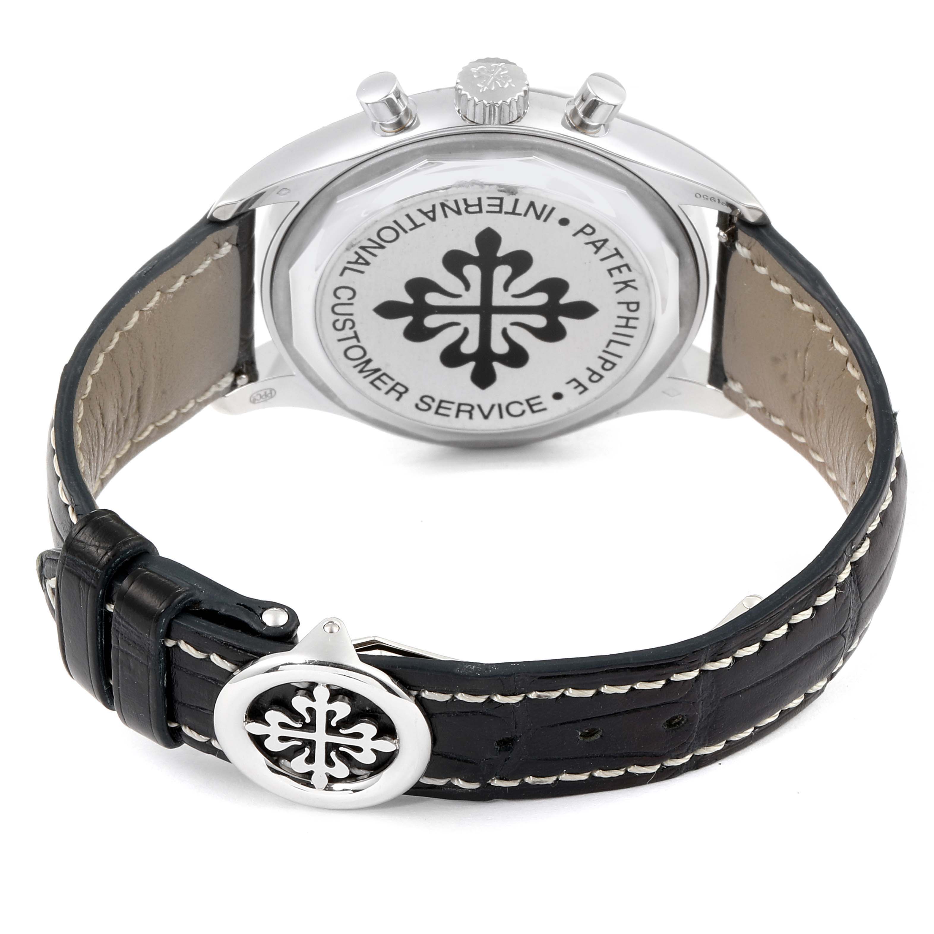 This image shows the back and strap of a Patek Philippe Complications 5960/01G Men's White Gold Blue Dial 5960/01G Men's White Gold Blue Dial watch, highlighting the logo and customer service information.