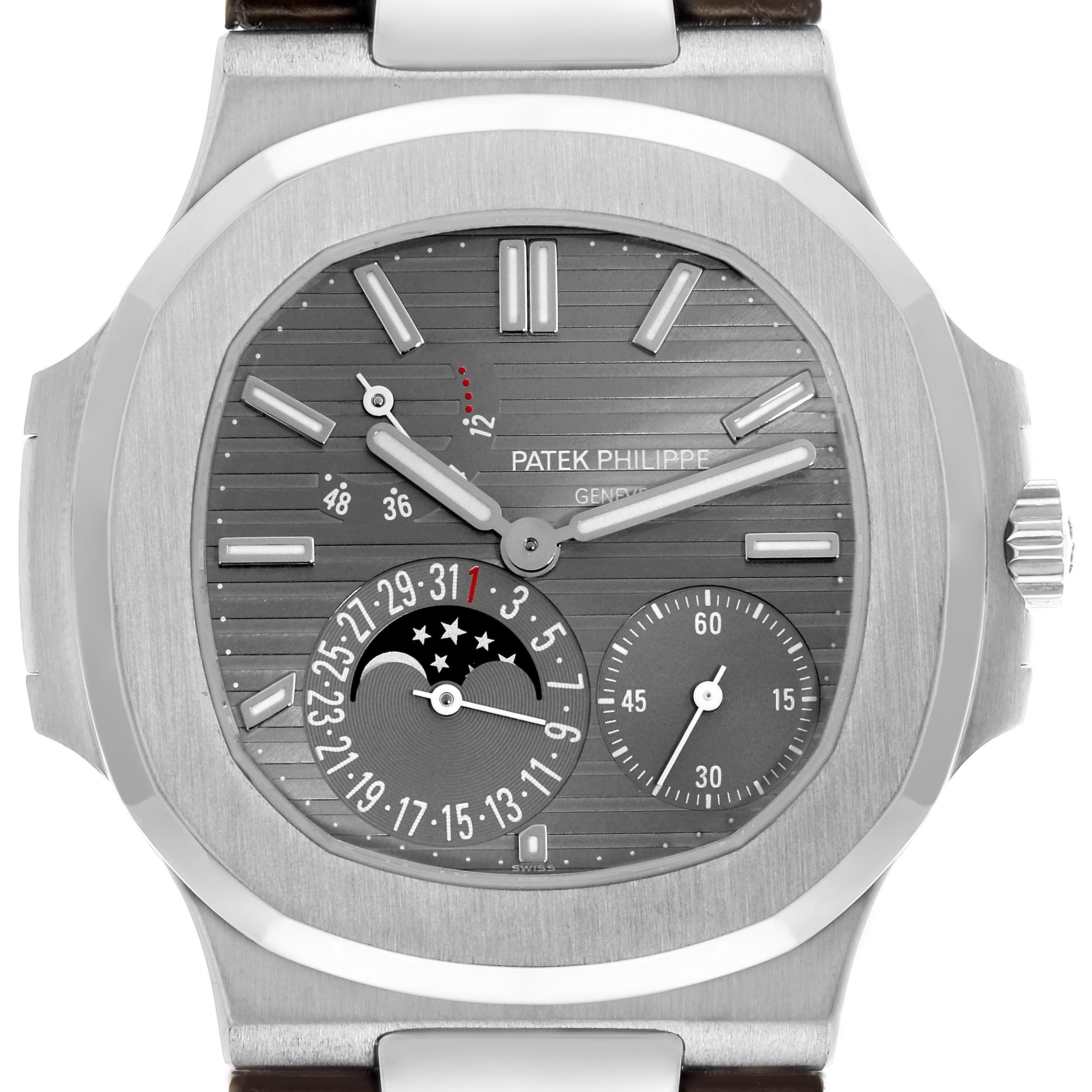 The Patek Philippe Nautilus 5712G-001 Men's White Gold Grey Dial 5712G-001 Men's White Gold Grey Dial watch is shown from the front, highlighting its dial, hands, subdials, and crown.