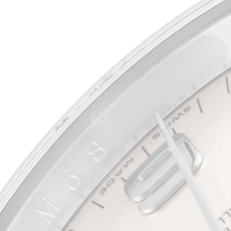 The image shows a close-up of the dial and bezel of a Rolex Air-King 114200 Men's Stainless Steel Silver Dial 114200 Men's Stainless Steel Silver Dial watch, focusing on the hour markers and the minute hand.