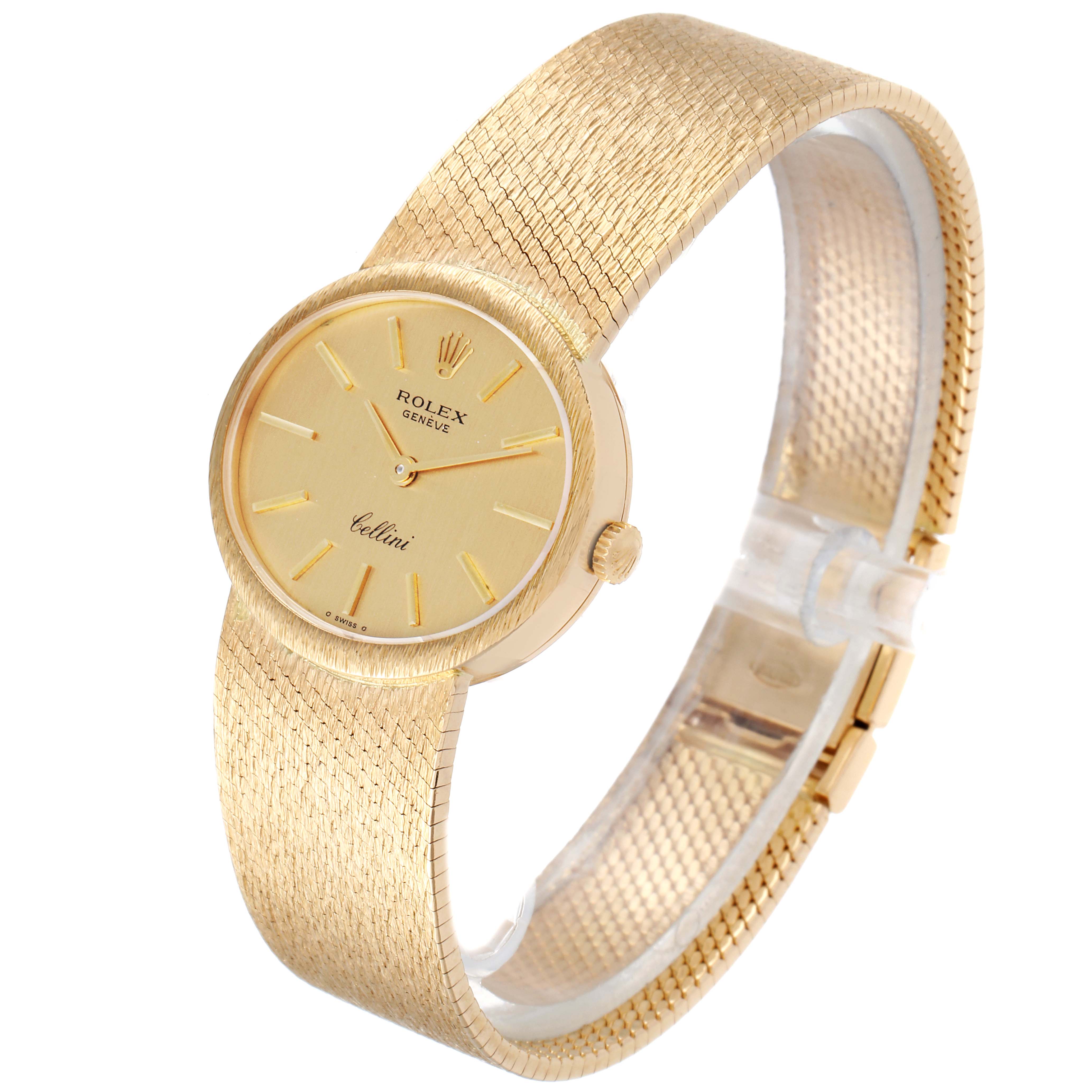 The image shows a Rolex Cellini  Women
s Yellow Gold Champagne Dial  Women
s Yellow Gold Champagne Dial watch from an angle highlighting its gold dial, crown, and textured bracelet.