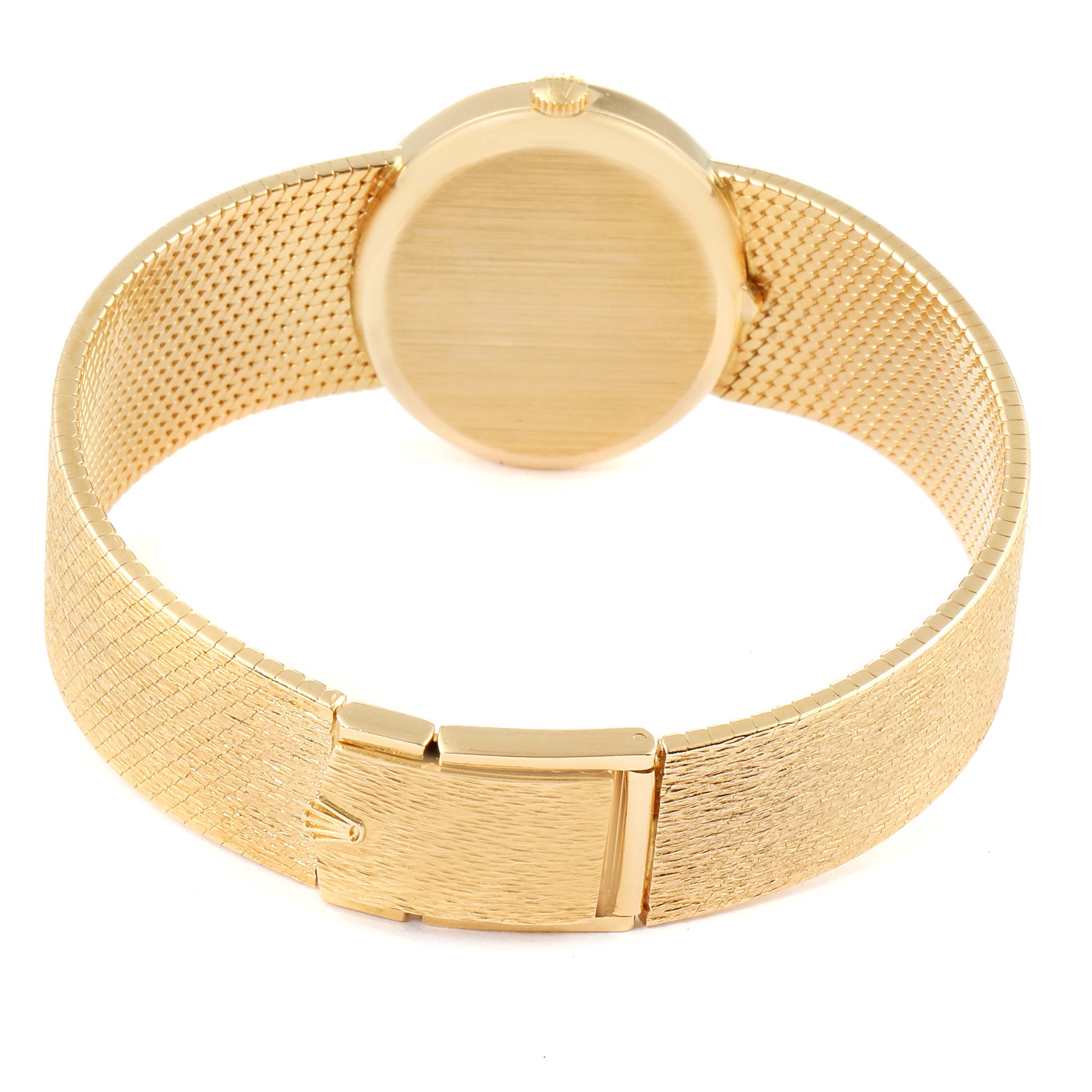 The image shows the back view of a Rolex Cellini  Women
s Yellow Gold Champagne Dial  Women
s Yellow Gold Champagne Dial watch, highlighting its case, crown, and mesh bracelet.