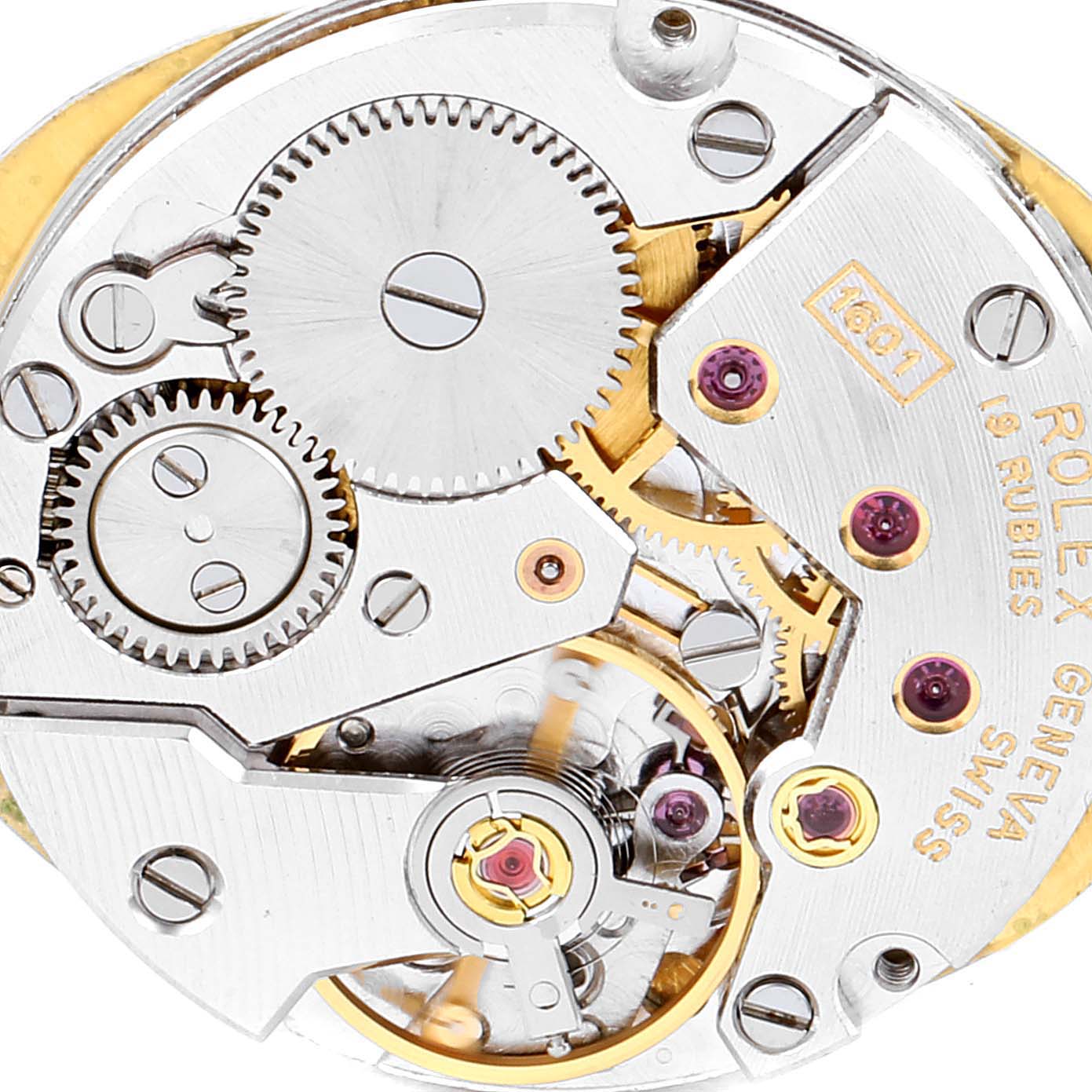 This image shows the intricate internal mechanical components and gears of a Rolex Cellini  Women
s Yellow Gold Champagne Dial  Women
s Yellow Gold Champagne Dial watch from a close-up angle.